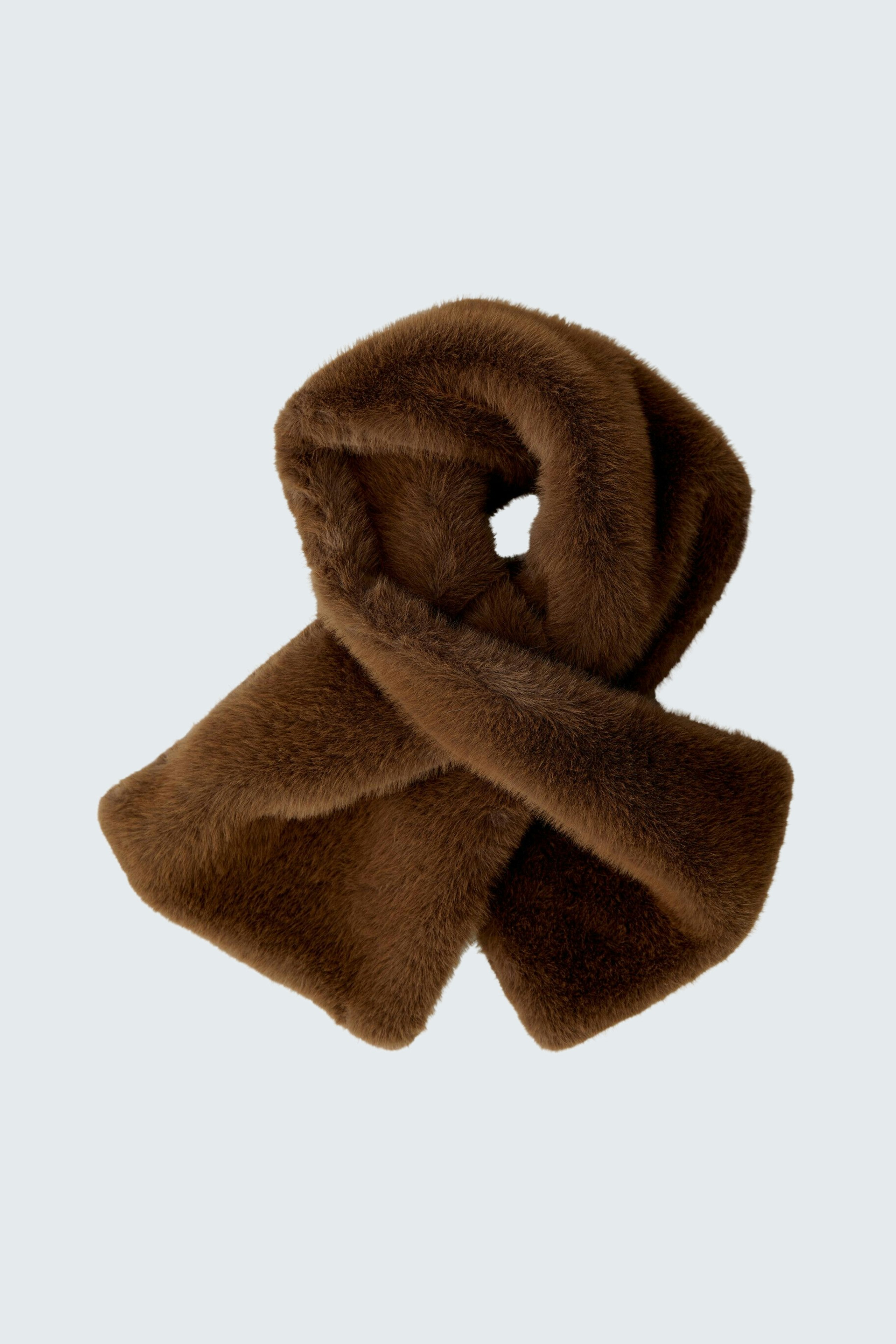 Soft brown scarf: Cozy accessory for women, perfect for adding warmth and style to any outfit.