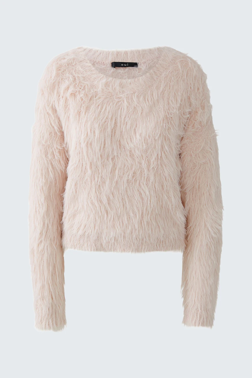 Cozy women's pullover in soft pink with a fluffy texture, perfect for casual wear.