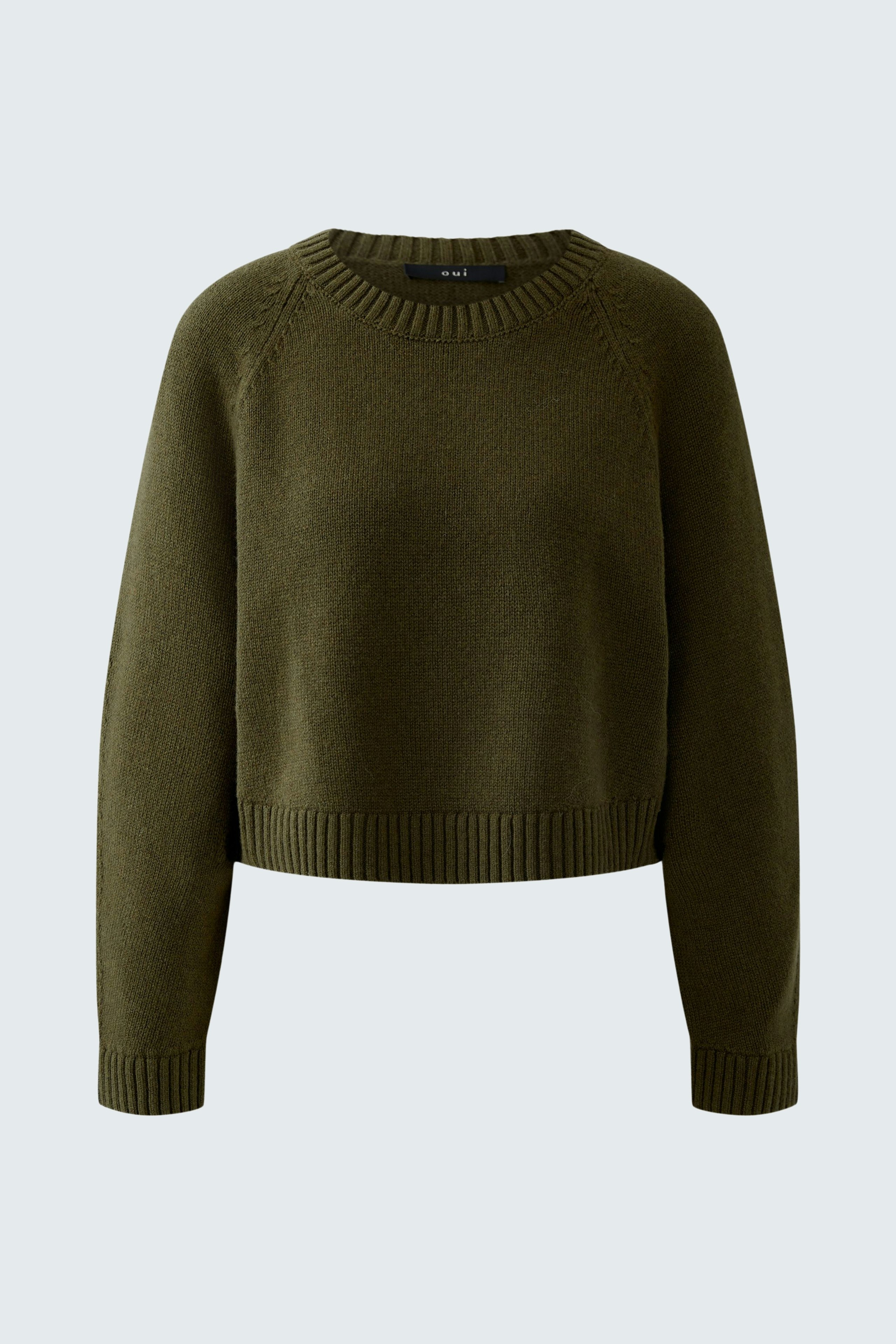 Casual women's pullover in dark green, featuring a relaxed fit and ribbed hem.