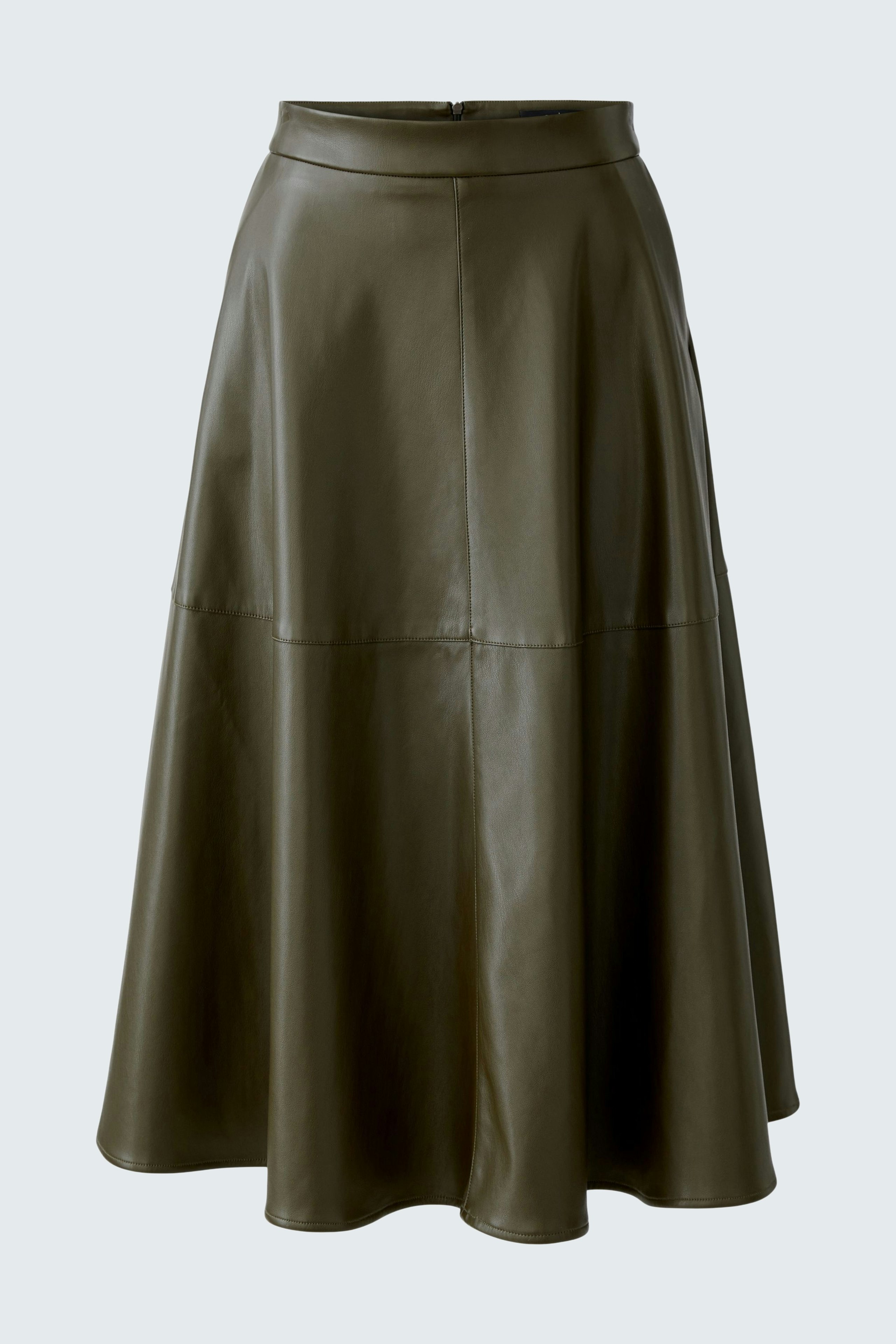 A-line skirt: A woman in a stylish olive green skirt with a flared design, perfect for casual wear.