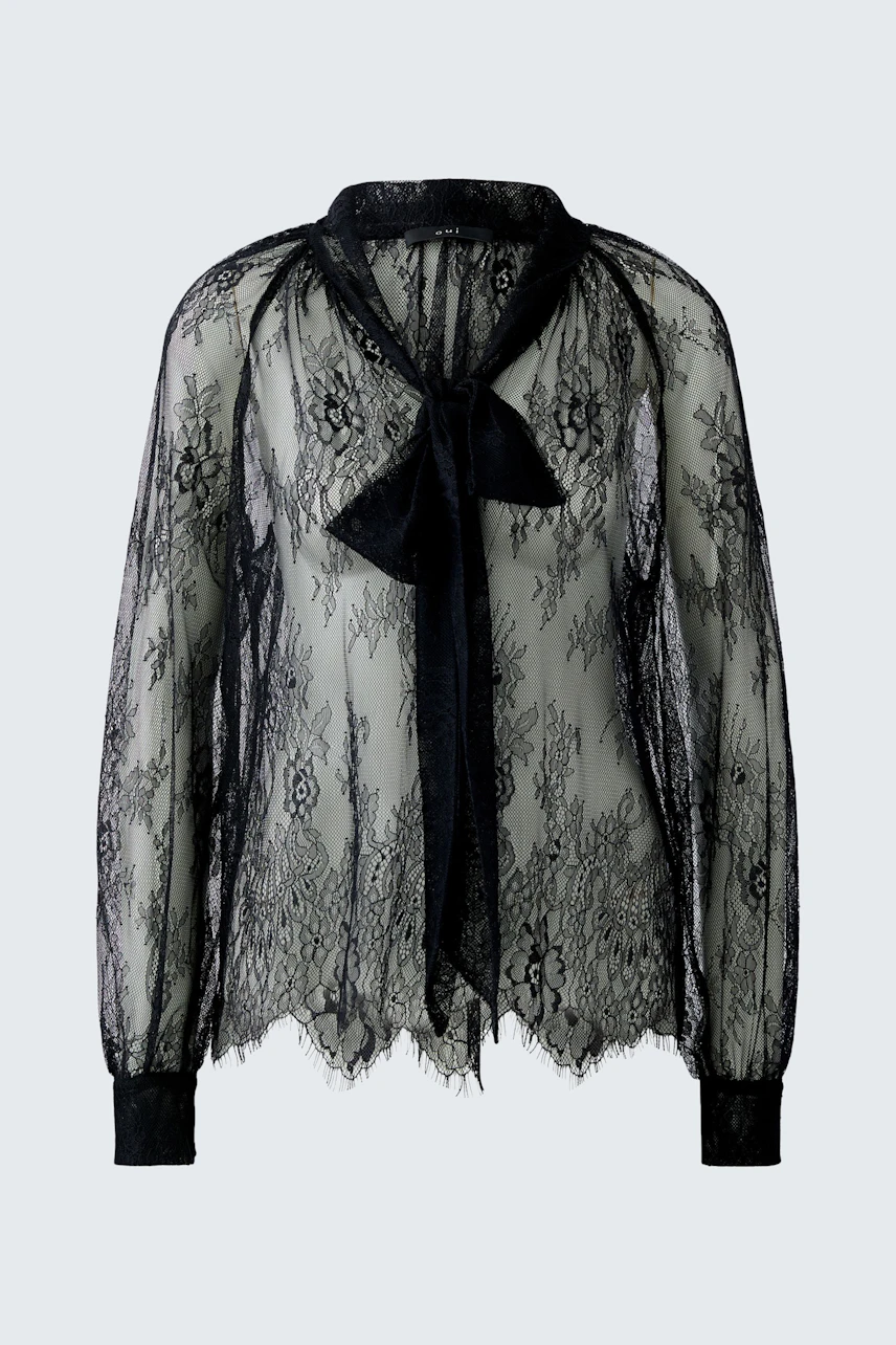 Lightweight black blouse with lace details and a bow tie collar.