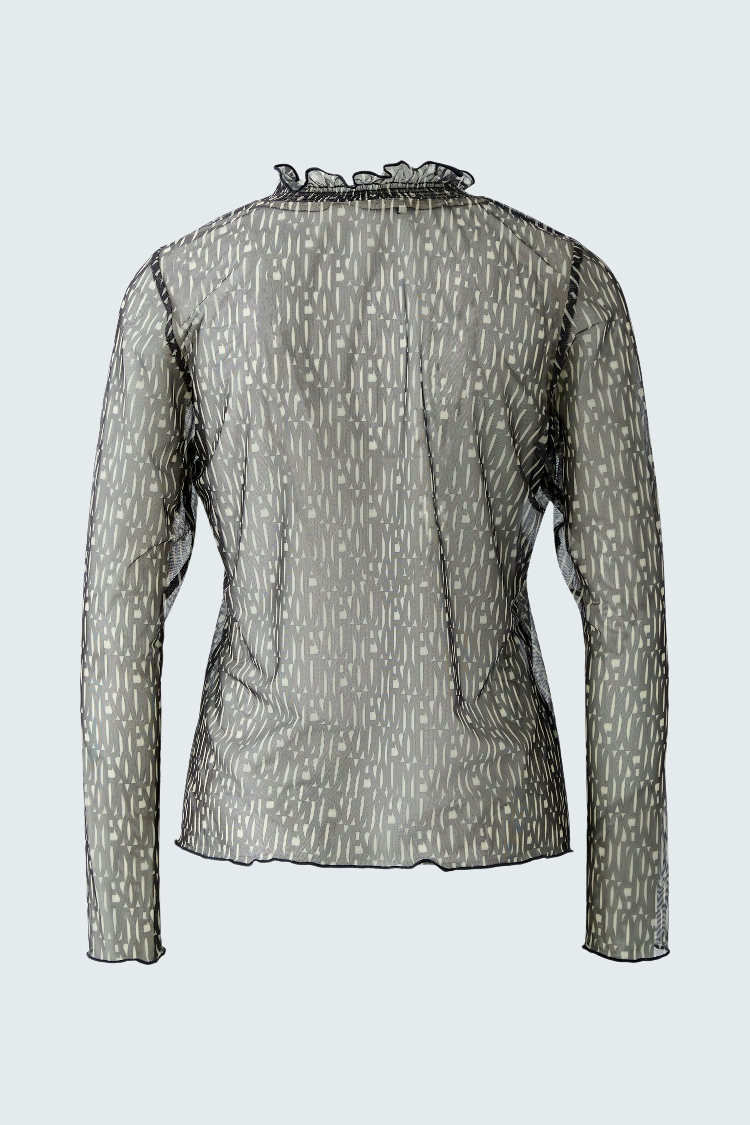 Stylish women's long-sleeve shirt in a unique pattern, perfect for casual wear.