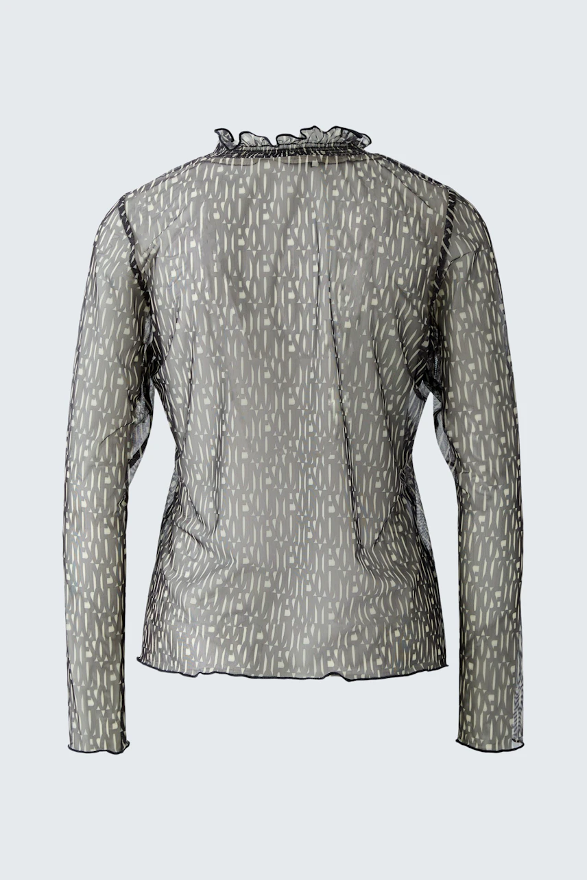 Stylish women's long-sleeve shirt in a unique pattern, perfect for casual wear.