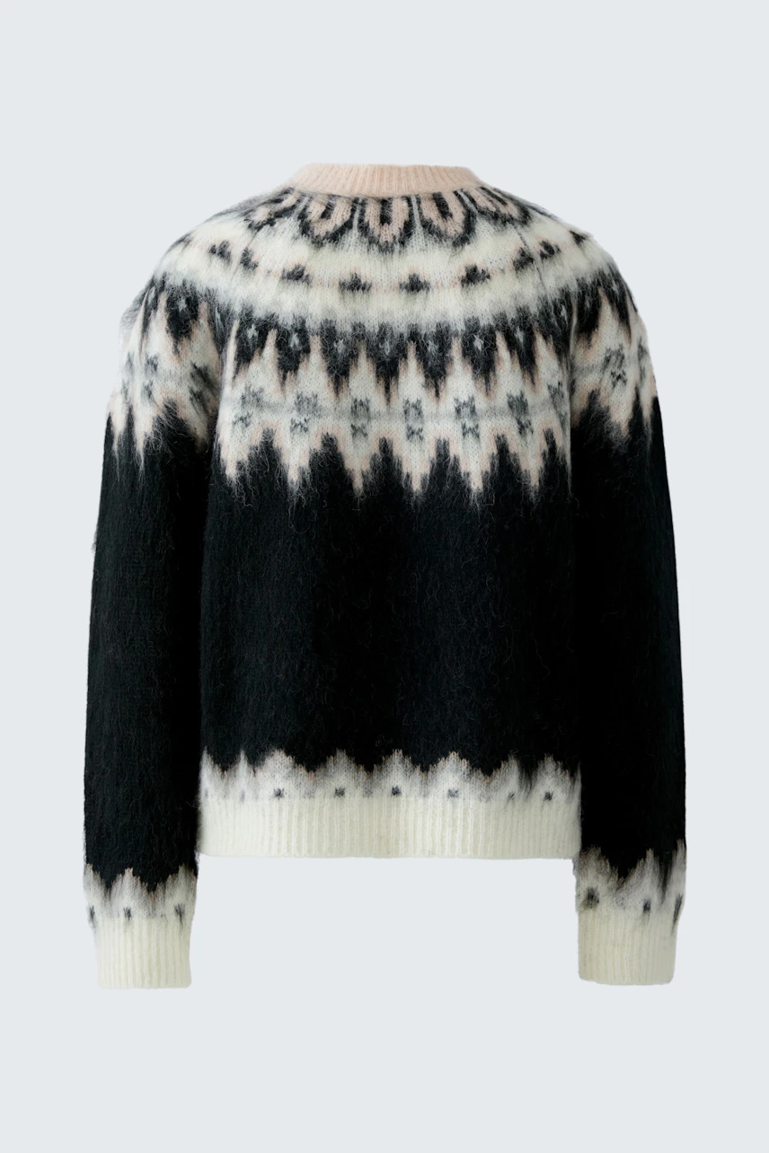 Damen-Pullover: Rückansicht eines kuscheligen, gemusterten Pullovers in Schwarz und Creme.