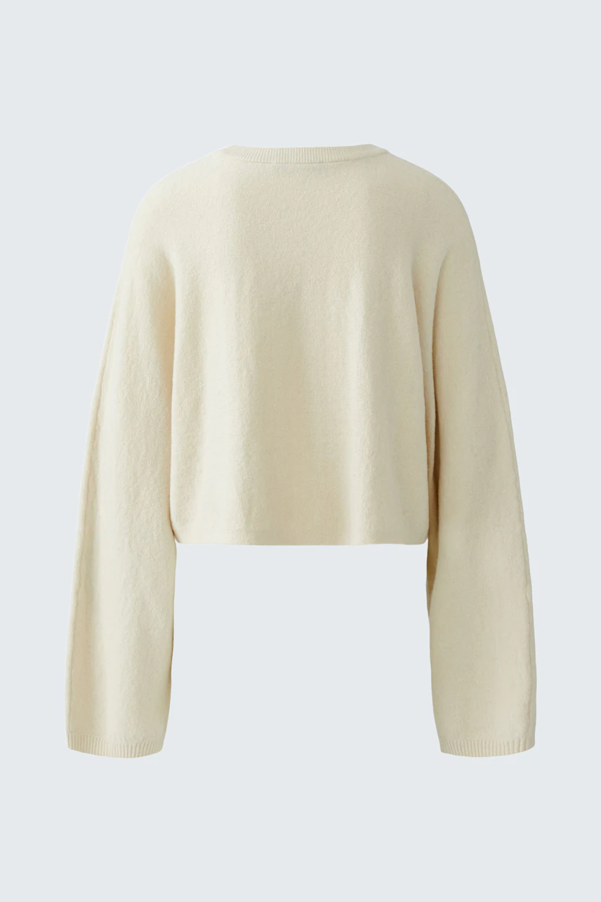 Bequemer Damen-Pullover in Cremefarbe mit lässigem Schnitt und langen Ärmeln.