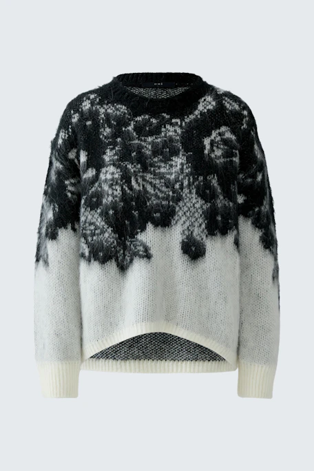 Casual women's pullover: Soft black and white knit with a unique pattern, perfect for everyday wear.