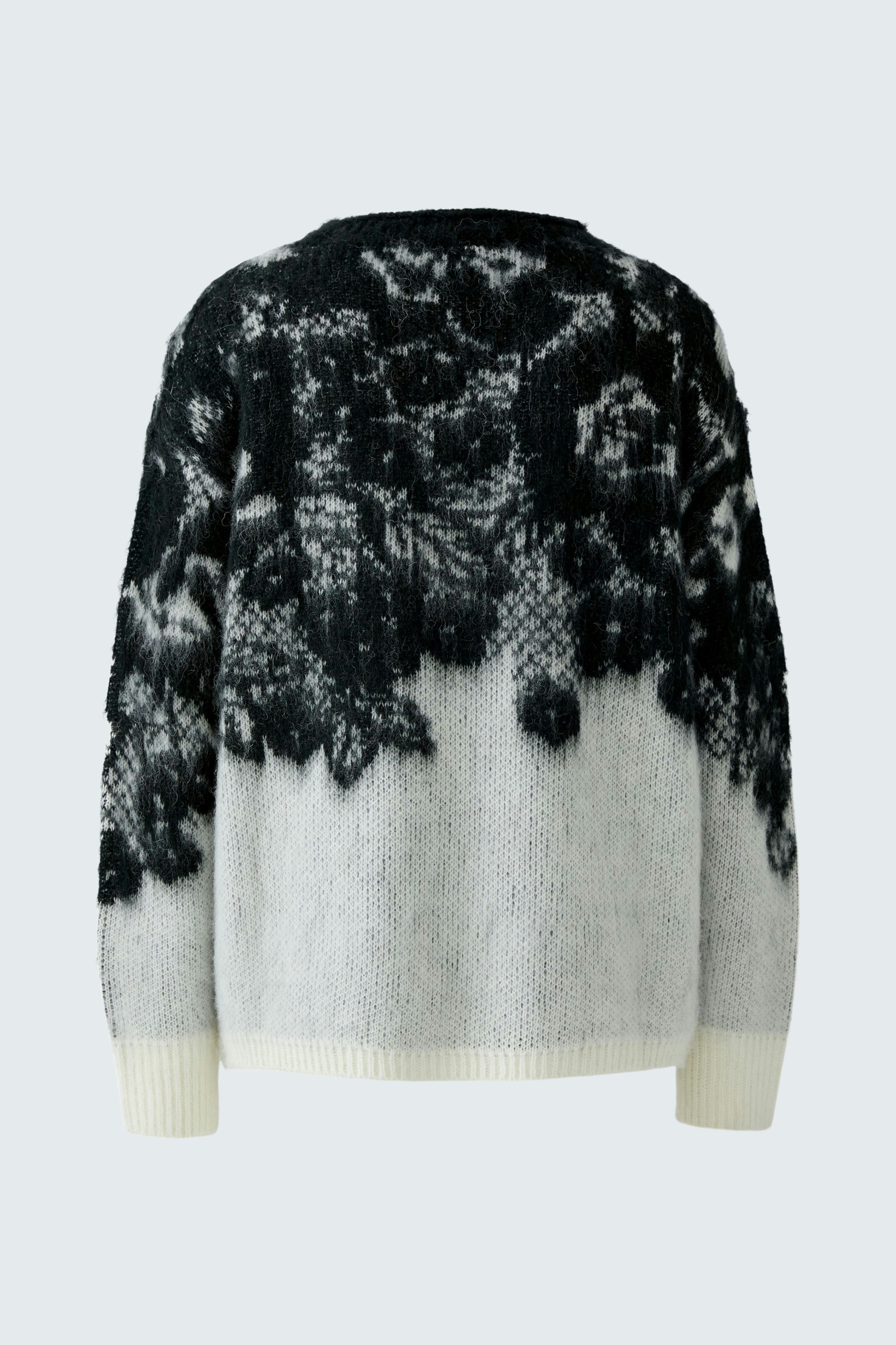 Casual women's pullover: Cozy design with a black and white pattern, perfect for everyday wear.