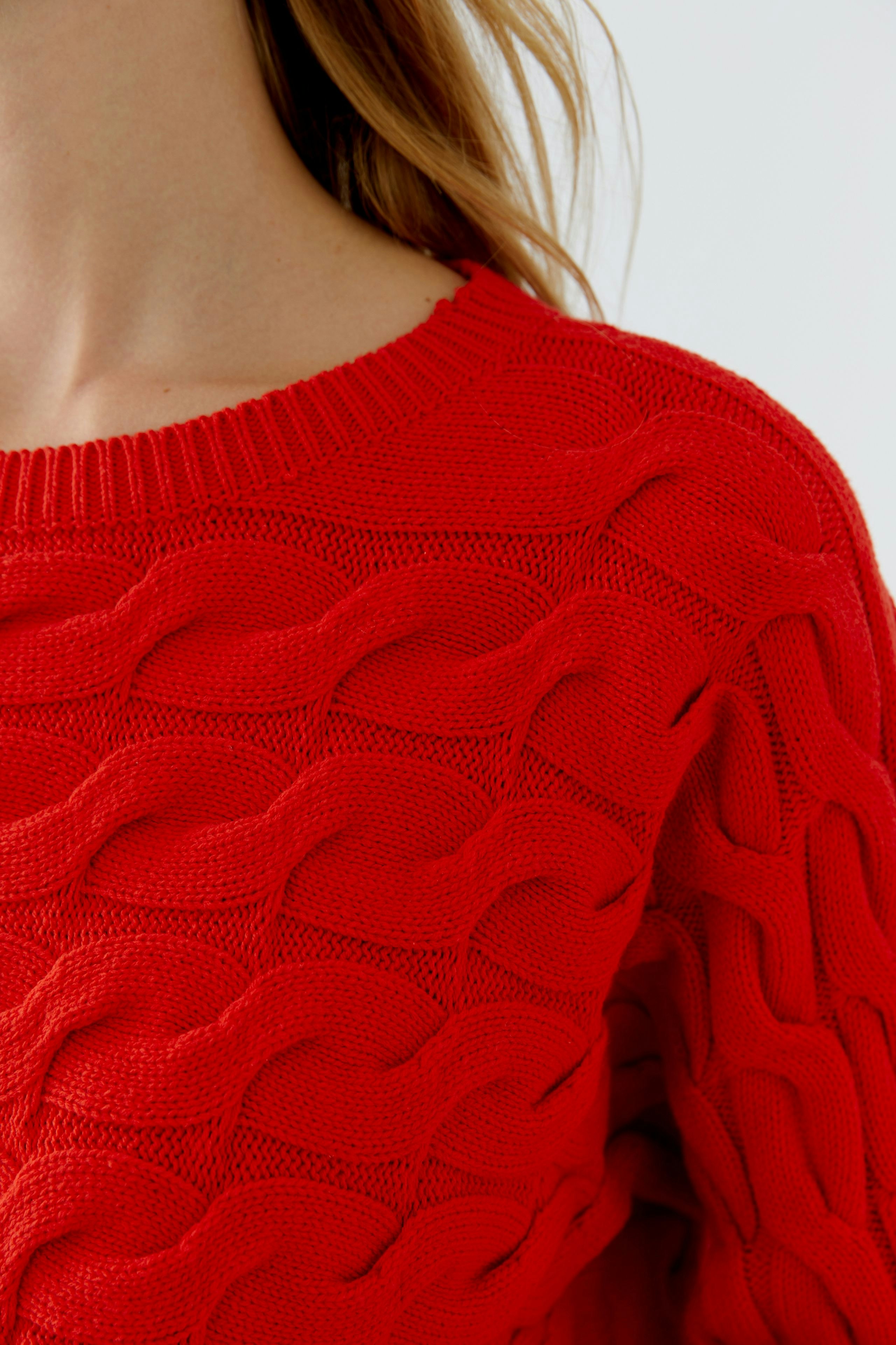 Damen-Pullover in leuchtendem Rot mit strukturiertem Muster, ideal für lässige Outfits.
