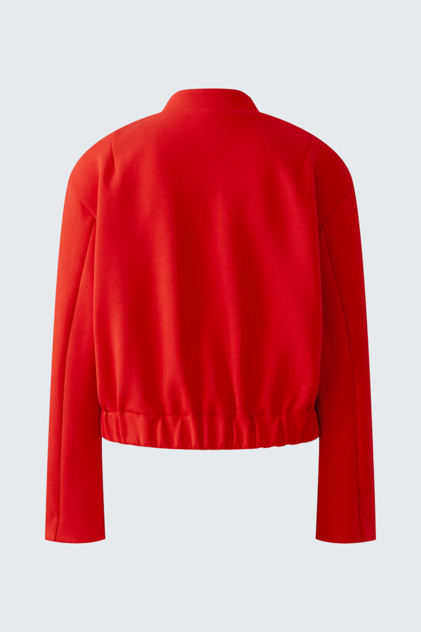 Roter Blouson: Rückansicht eines lässigen Damen-Blousons mit elastischem Bund.