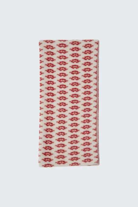 Cozy women's scarf: Red and white patterned scarf, perfect for adding warmth and style to any outfit.