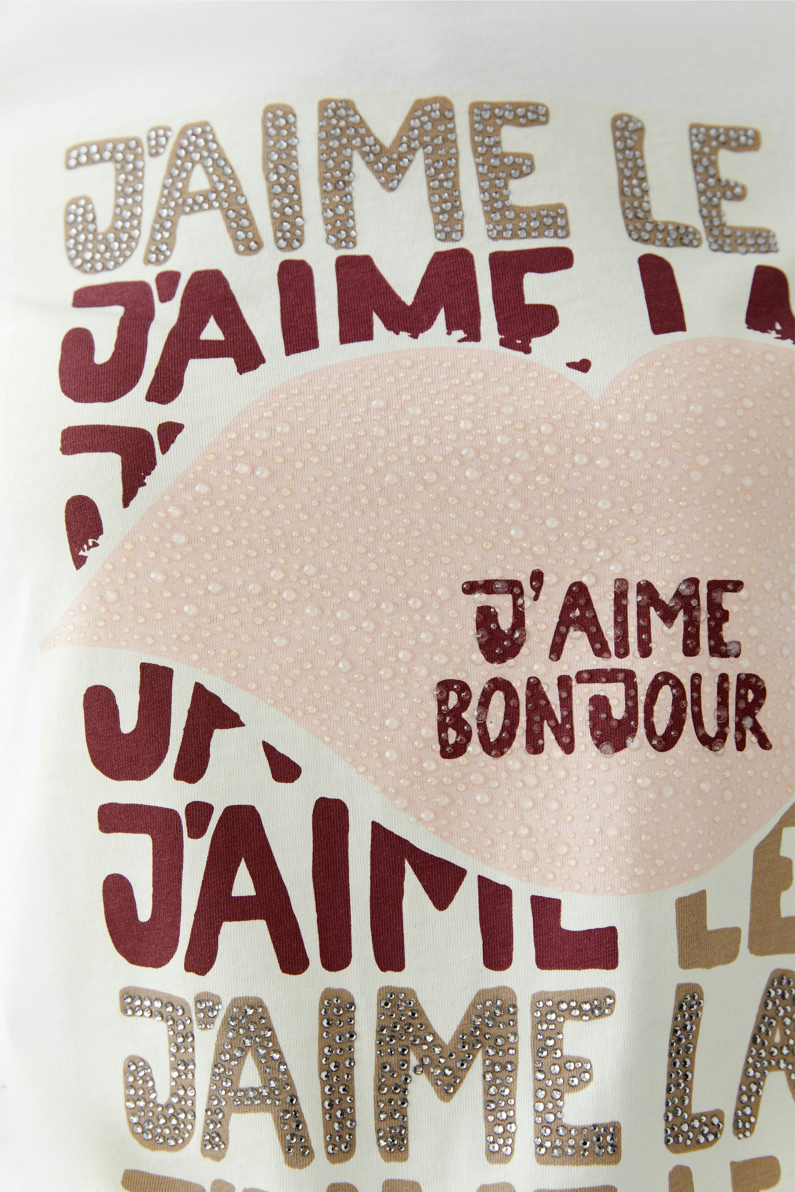 Casual women's T-shirt featuring a playful graphic design with lips and text.