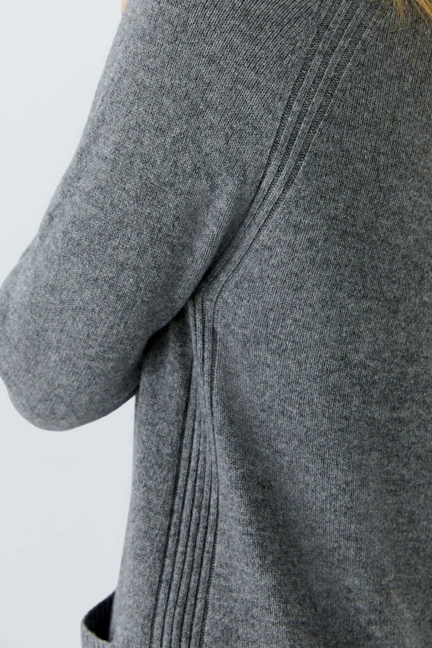 Casual women's knit dress in soft gray with a relaxed fit and stylish ribbed details.