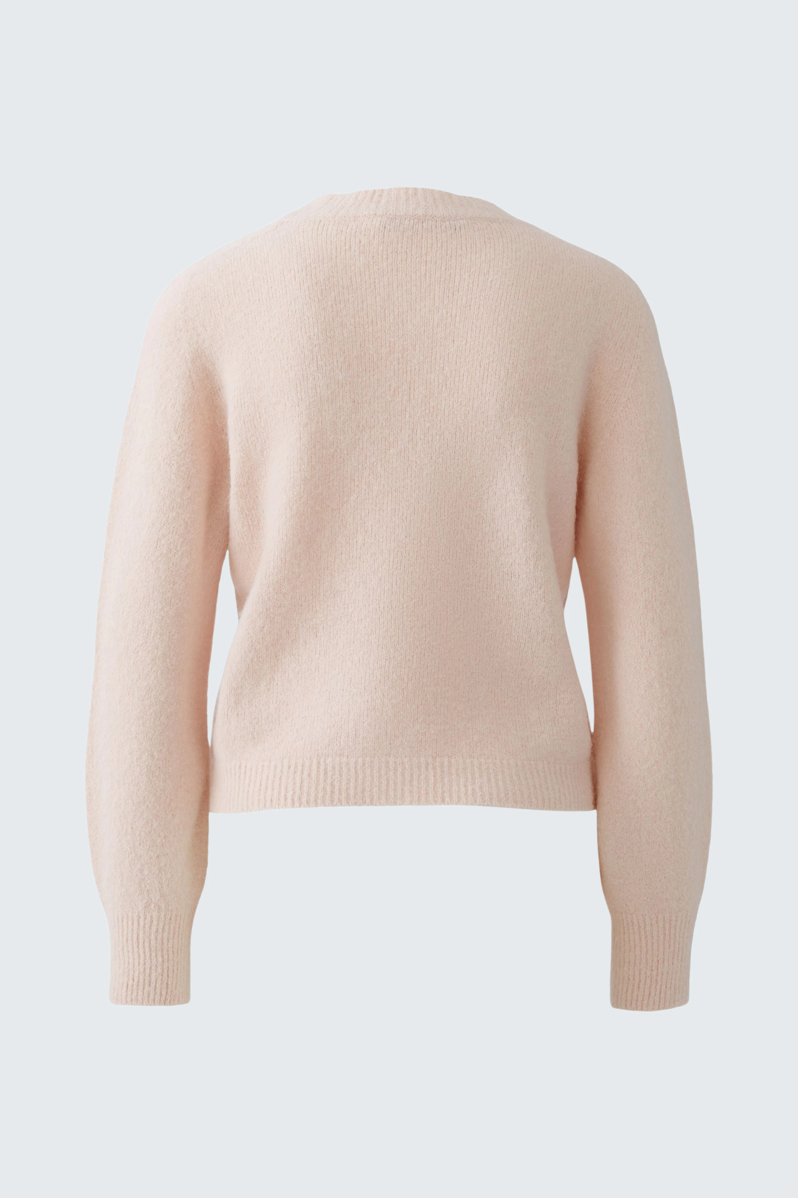 Soft pink pullover: Cozy women's pullover with a relaxed fit and round neckline.