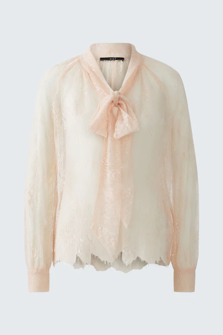 Light blouse with a bow tie detail, designed for women, featuring a soft, airy fabric.