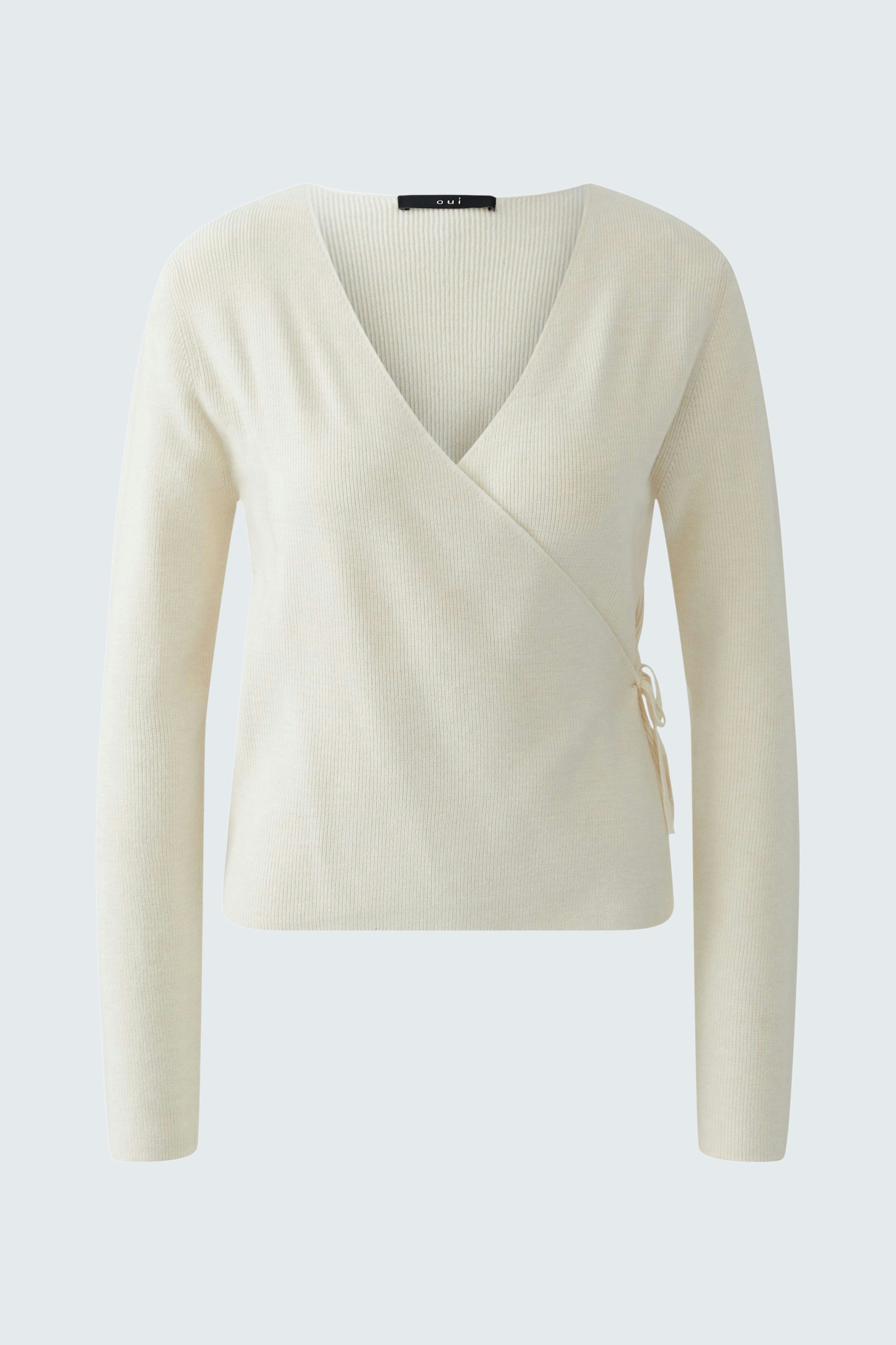 Bequemer Damen-Pullover in hellem Beige mit V-Ausschnitt und lässigem Schnitt.
