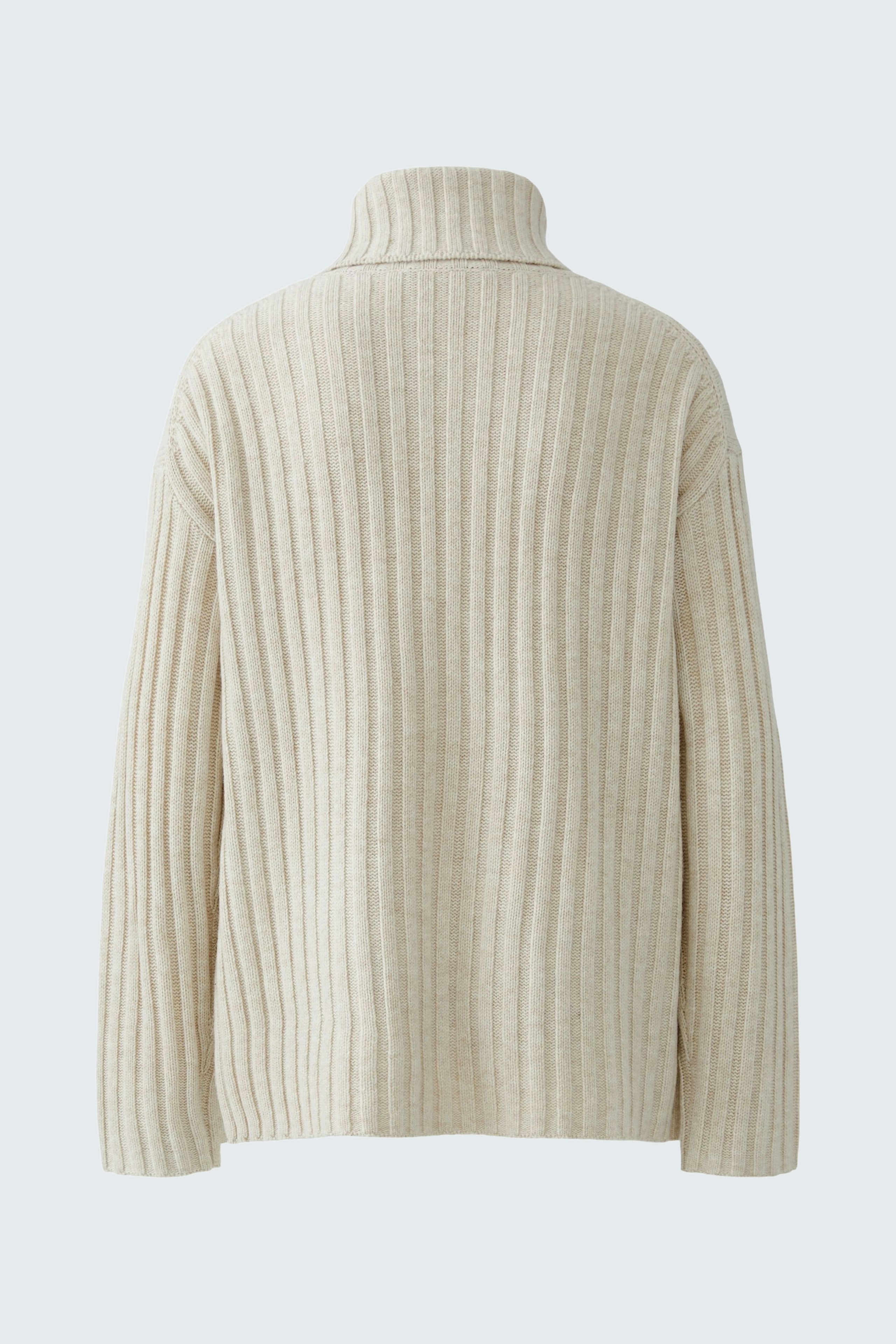 Casual women's pullover: Back view of a cream ribbed pullover with a high collar.