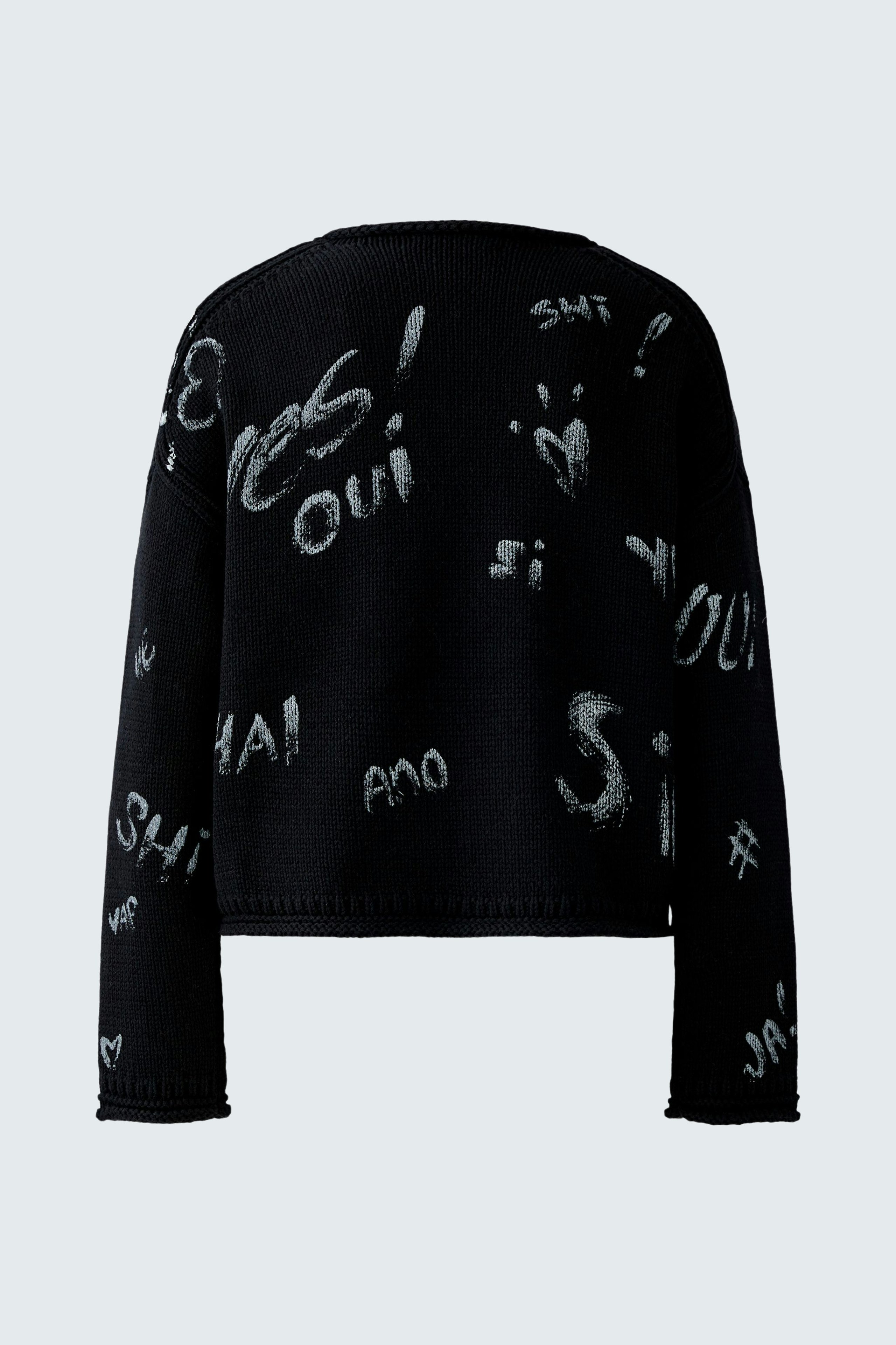 Casual women's pullover: Black pullover with playful white lettering, perfect for a relaxed look.