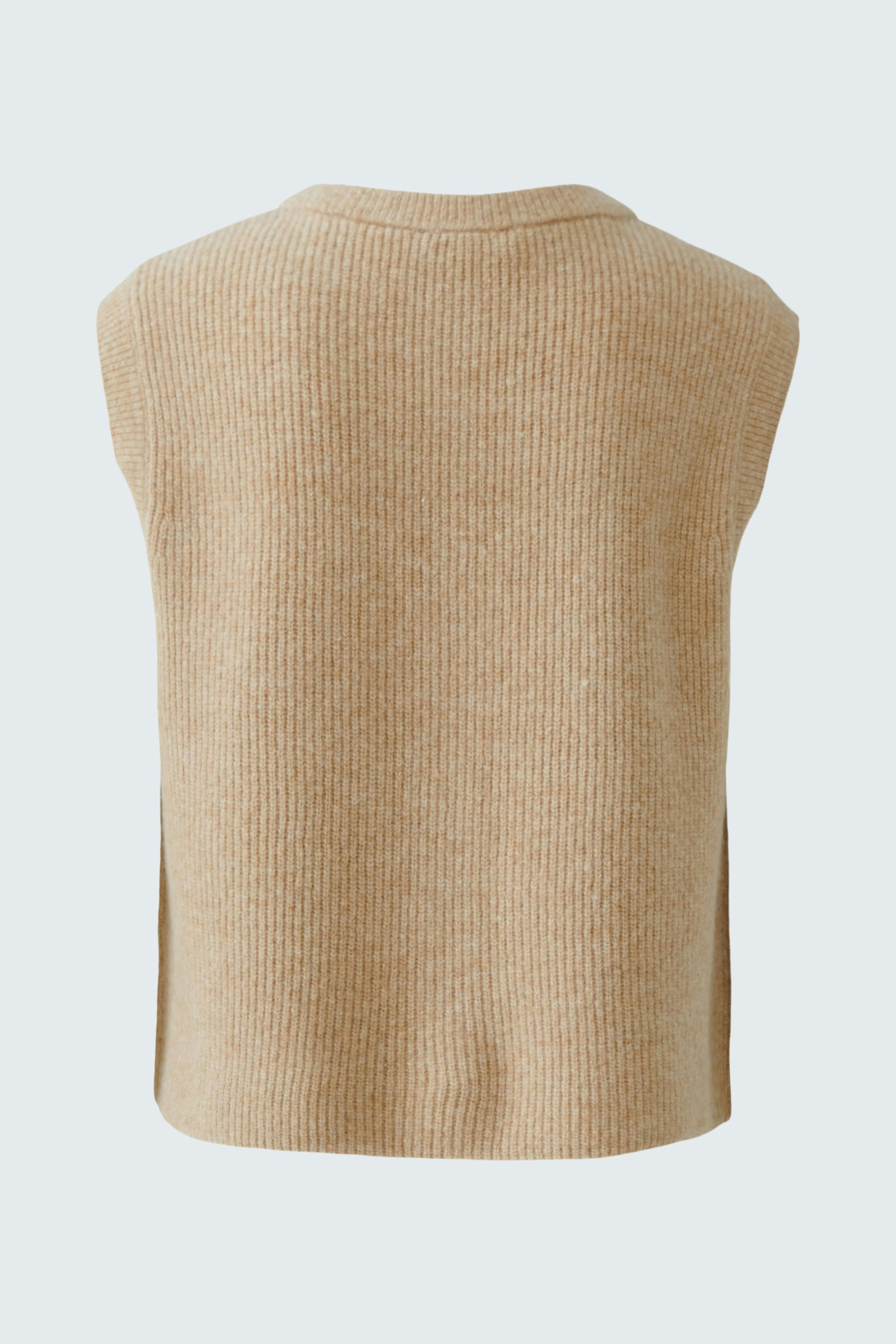 Casual women's vest: A beige sleeveless knit vest with a relaxed fit, perfect for layering.