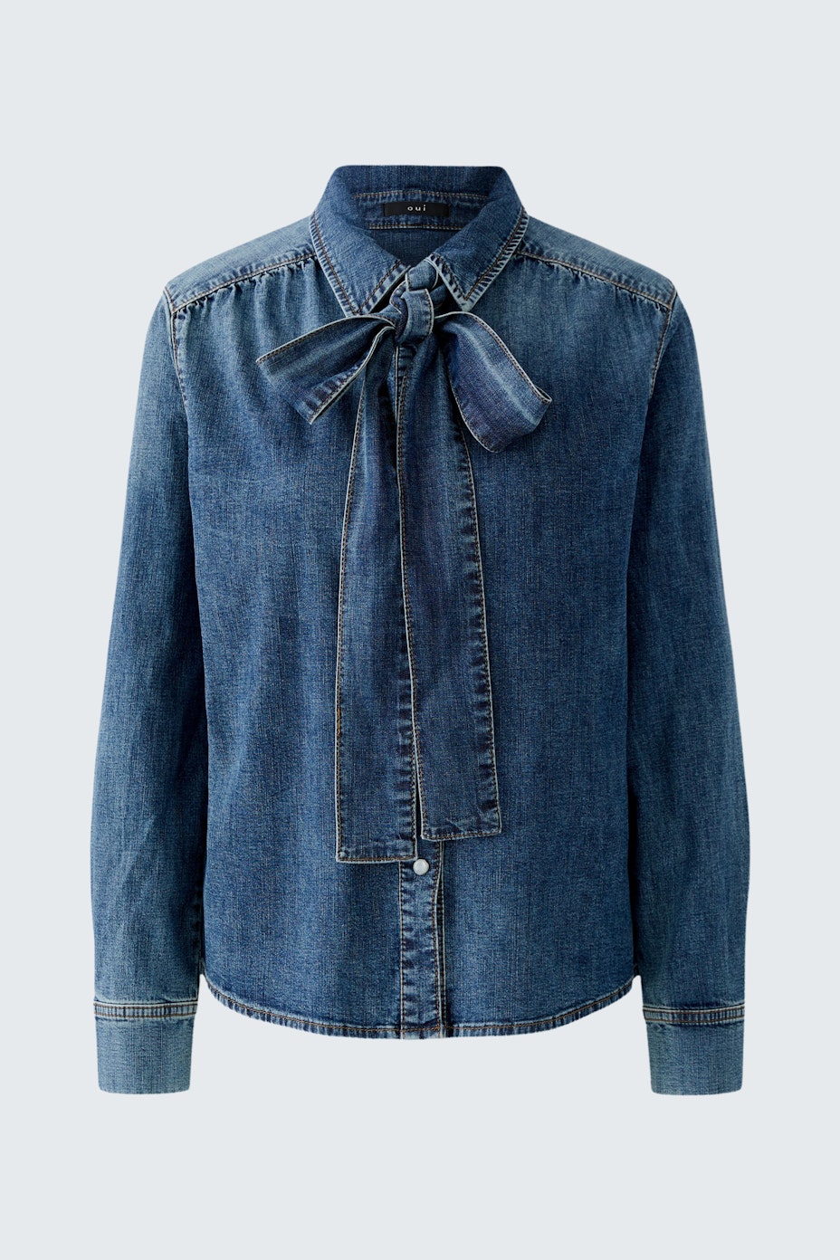 Casual women's denim shirt with a bow tie detail, perfect for everyday wear.