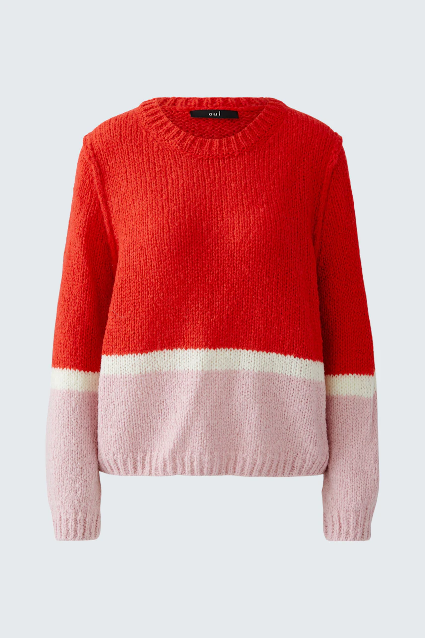 Cozy women's pullover in red and pink with a relaxed fit, perfect for casual outings.