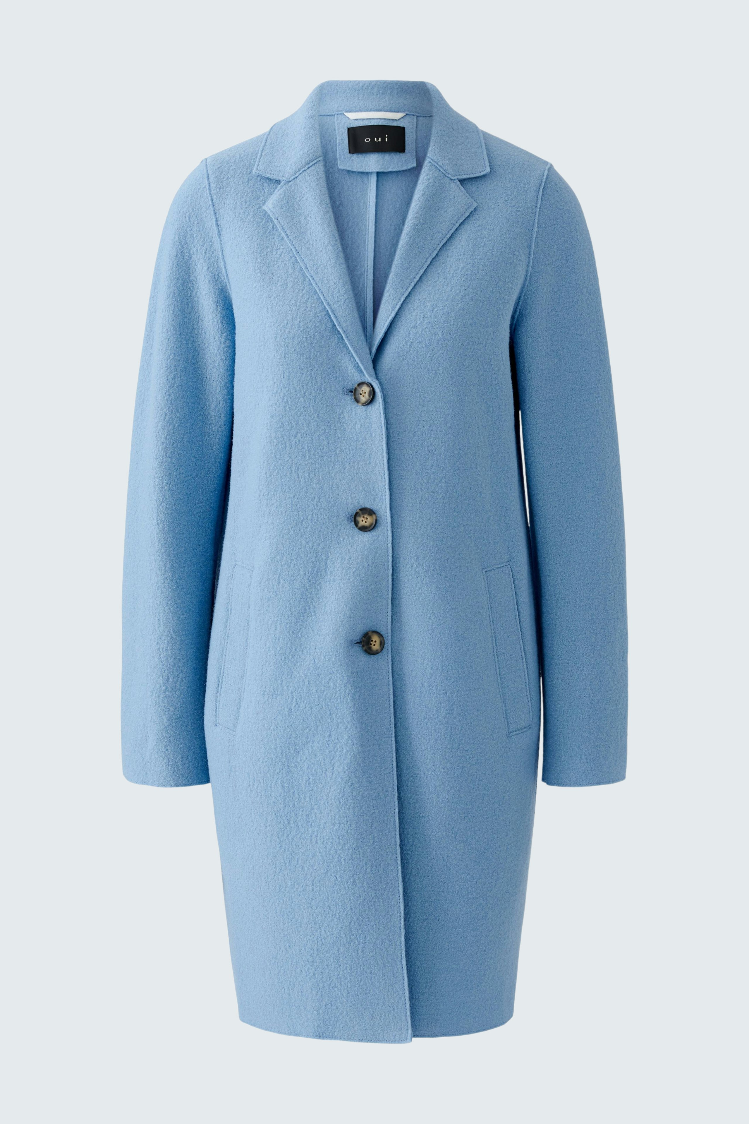 Light blue wool coat: A stylish women's coat with a classic collar and button closure.