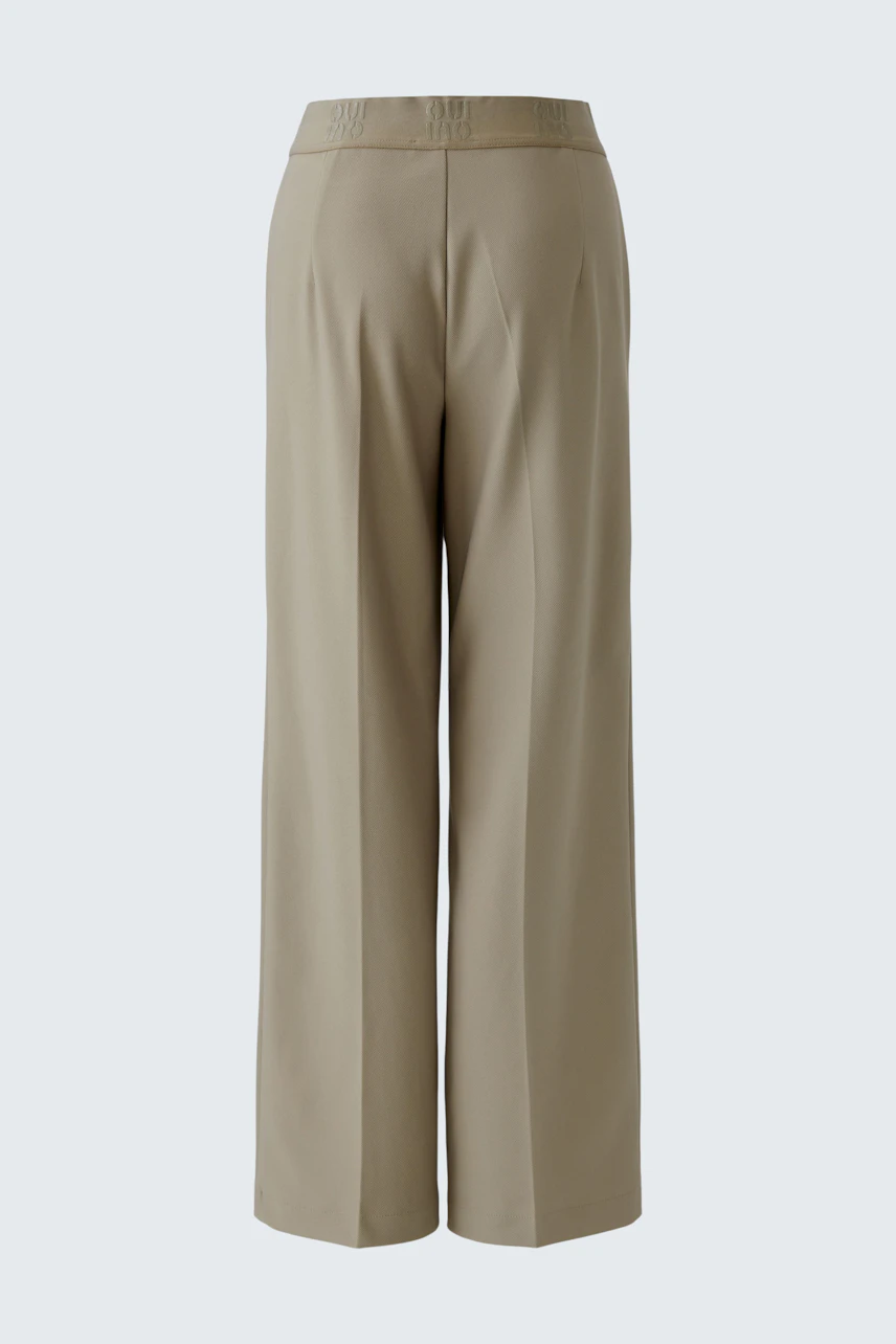Bequeme Damen-Hose in Beige mit weitem Schnitt, ideal für lässige Outfits.
