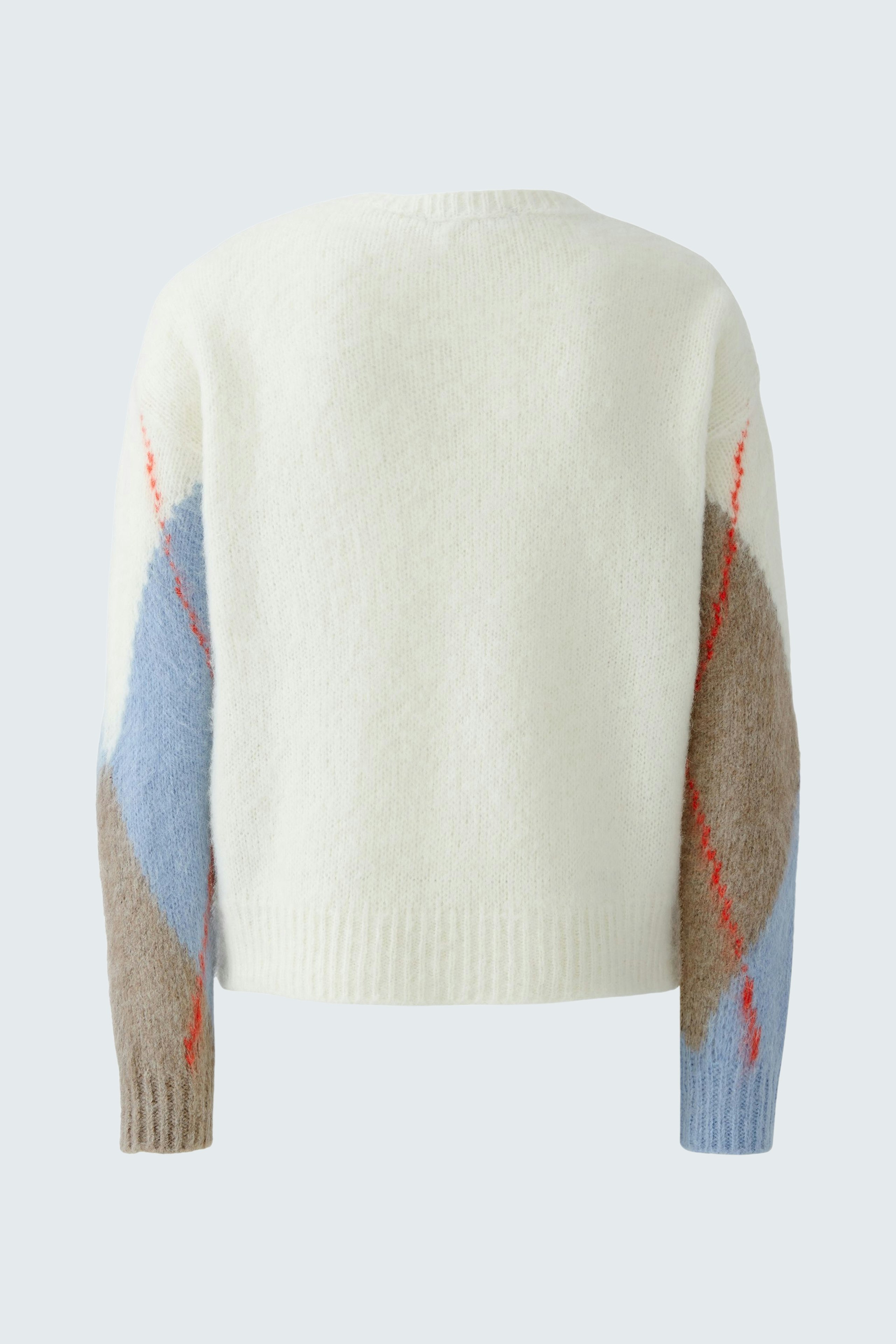 Cozy women's pullover: Soft white knit with colorful geometric patterns on sleeves.