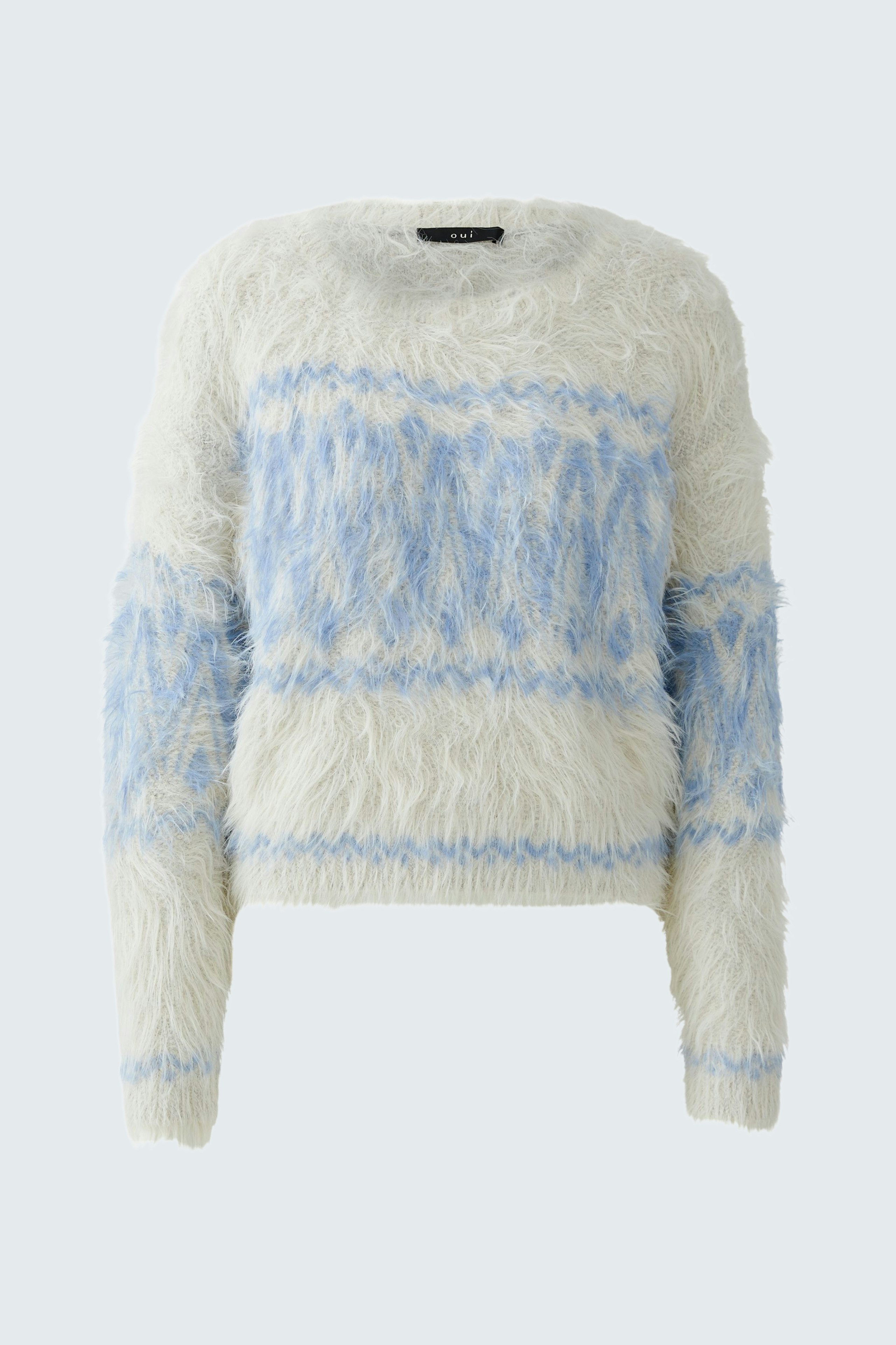 Cozy women's pullover in fluffy white and blue pattern, perfect for casual wear.