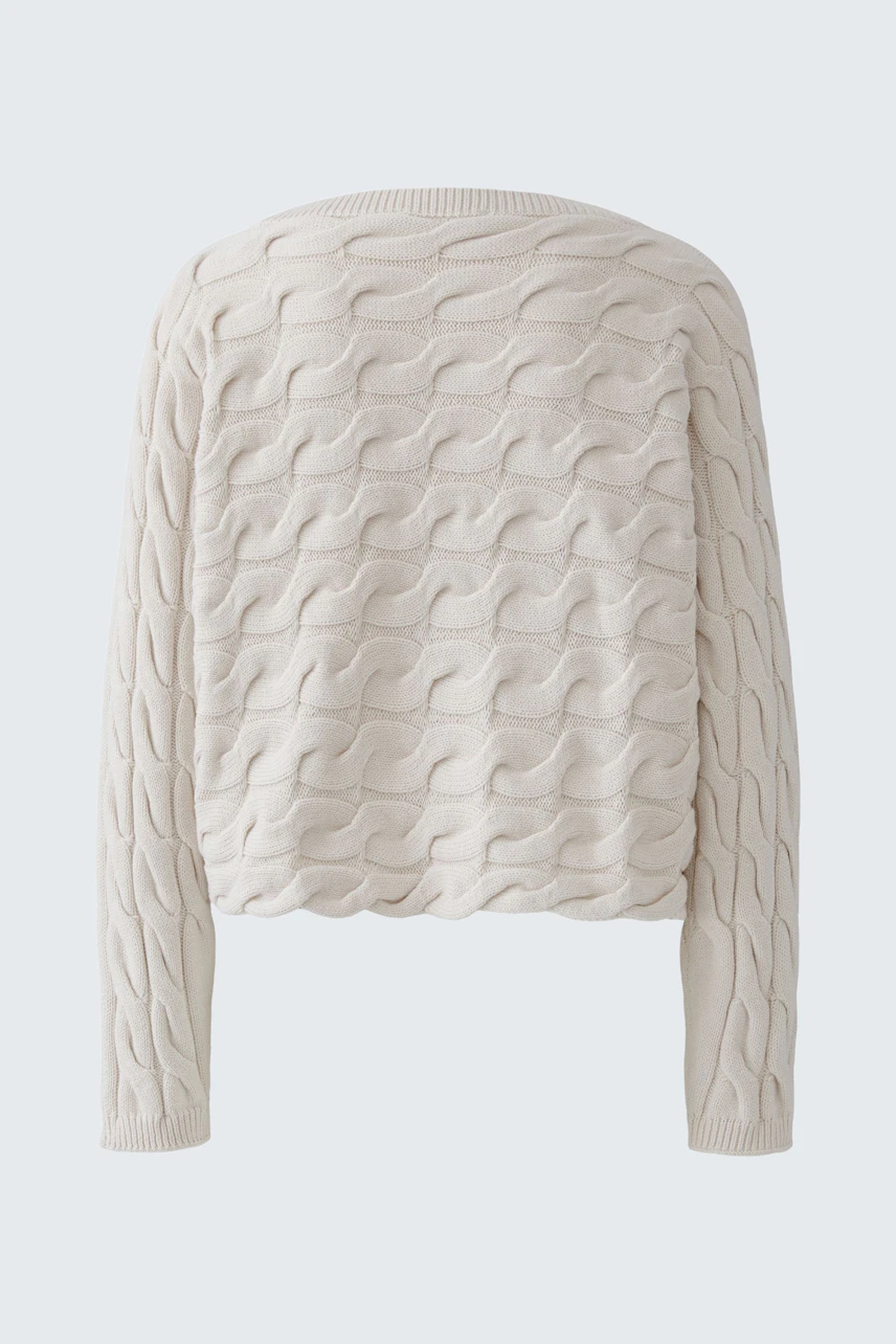 Bequemer Damen-Pullover in hellem Beige mit strukturiertem Wellenmuster, ideal für lässige Outfits.