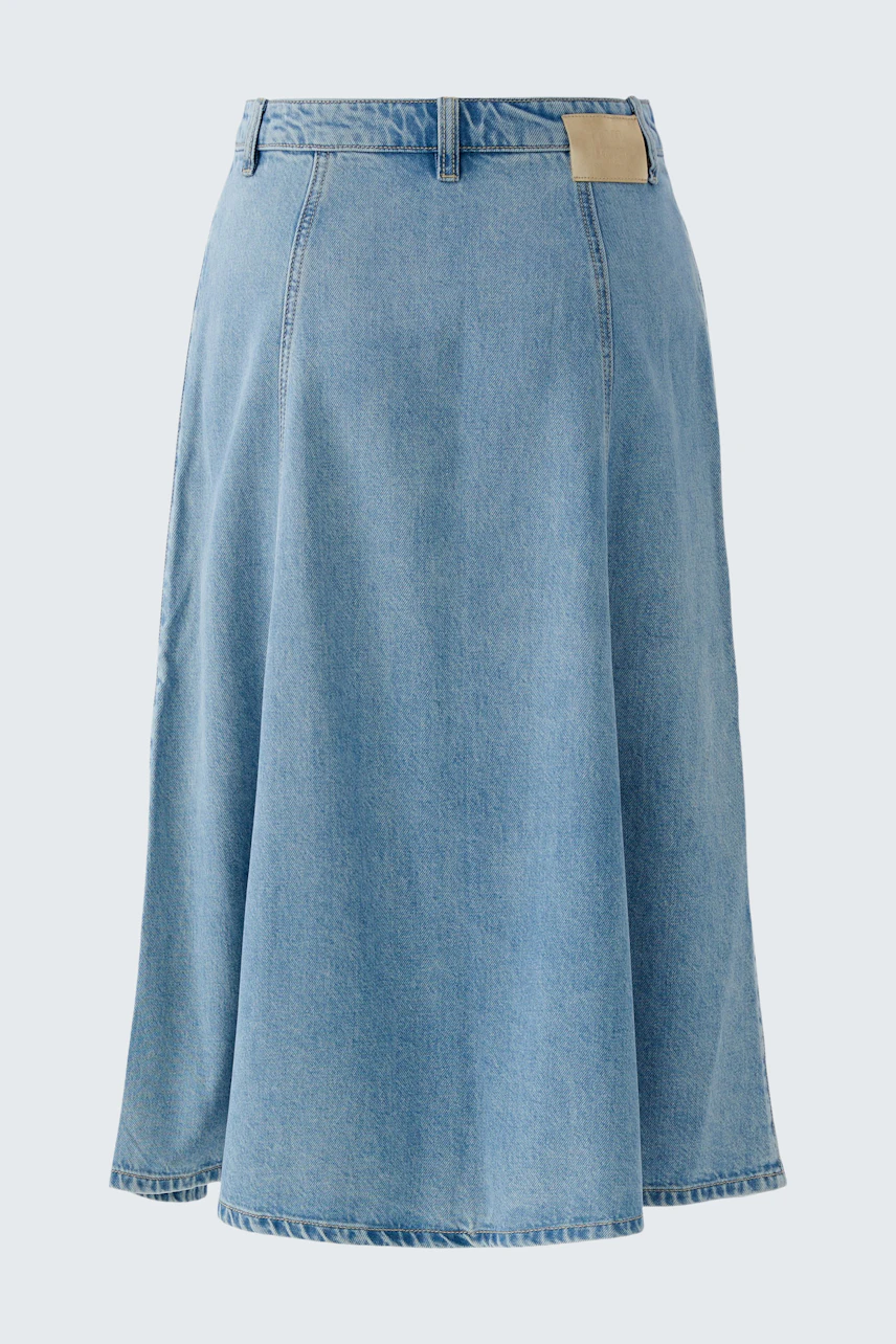 Casual denim skirt: A stylish blue skirt with a flared design, perfect for everyday wear.