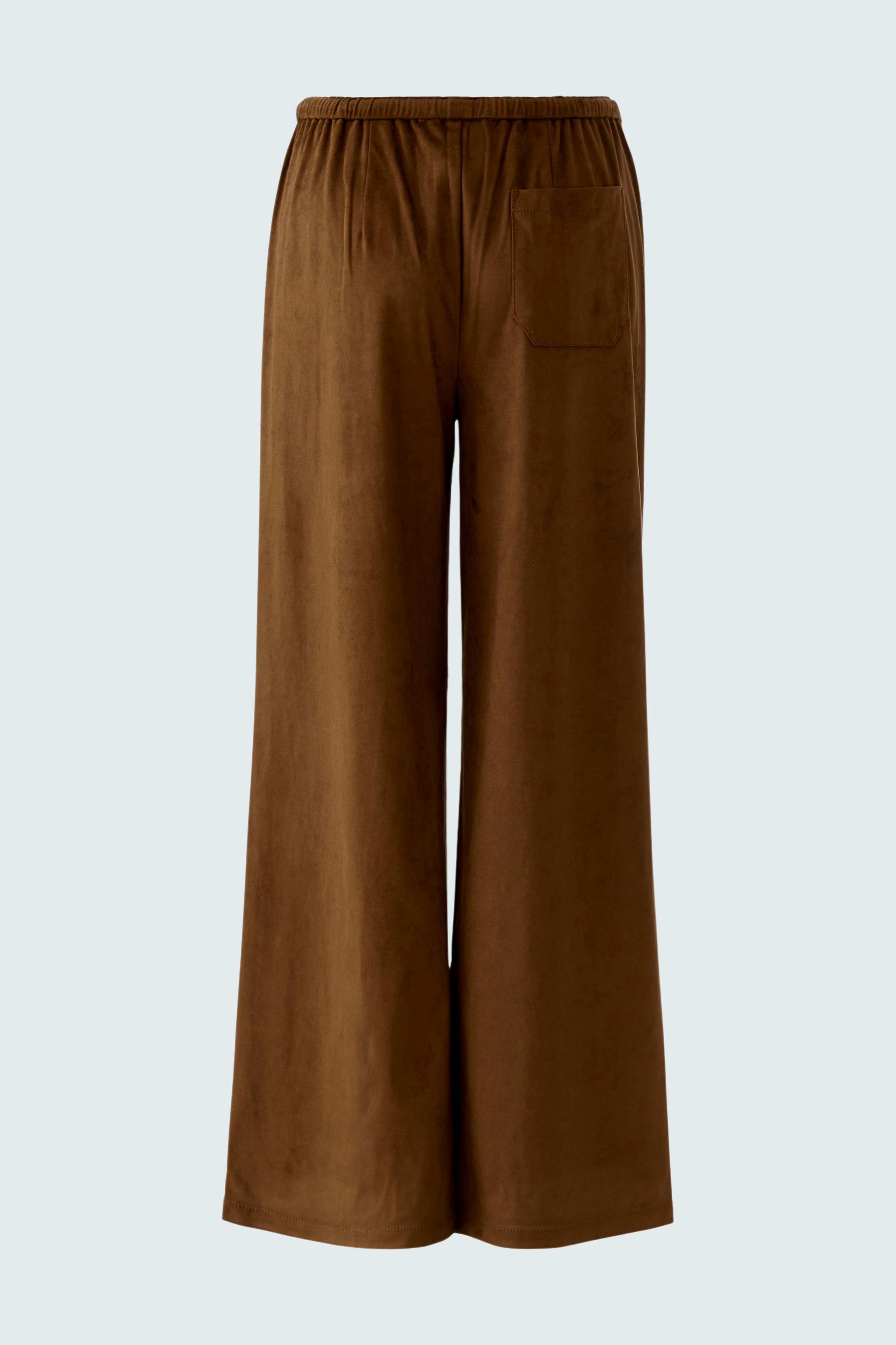 Comfortable women's faux leather pants in a rich brown color, featuring a relaxed fit and elastic waistband.
