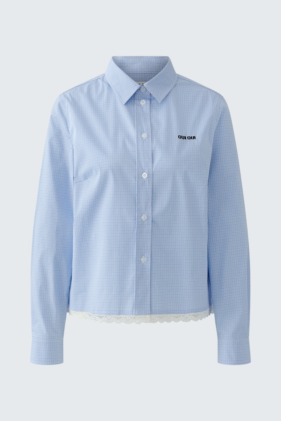 Casual women's shirt: Light blue button-up shirt with a relaxed fit and subtle logo detail.