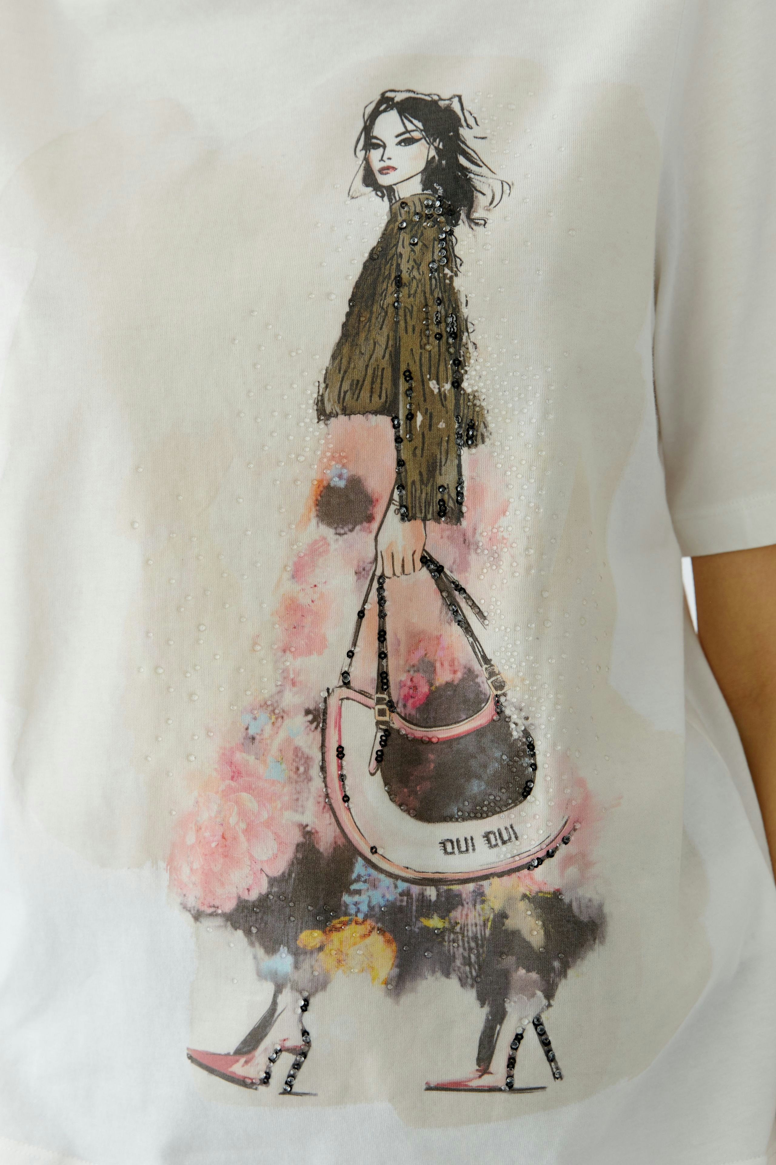 Stylish women's T-shirt featuring a colorful graphic design and relaxed fit.