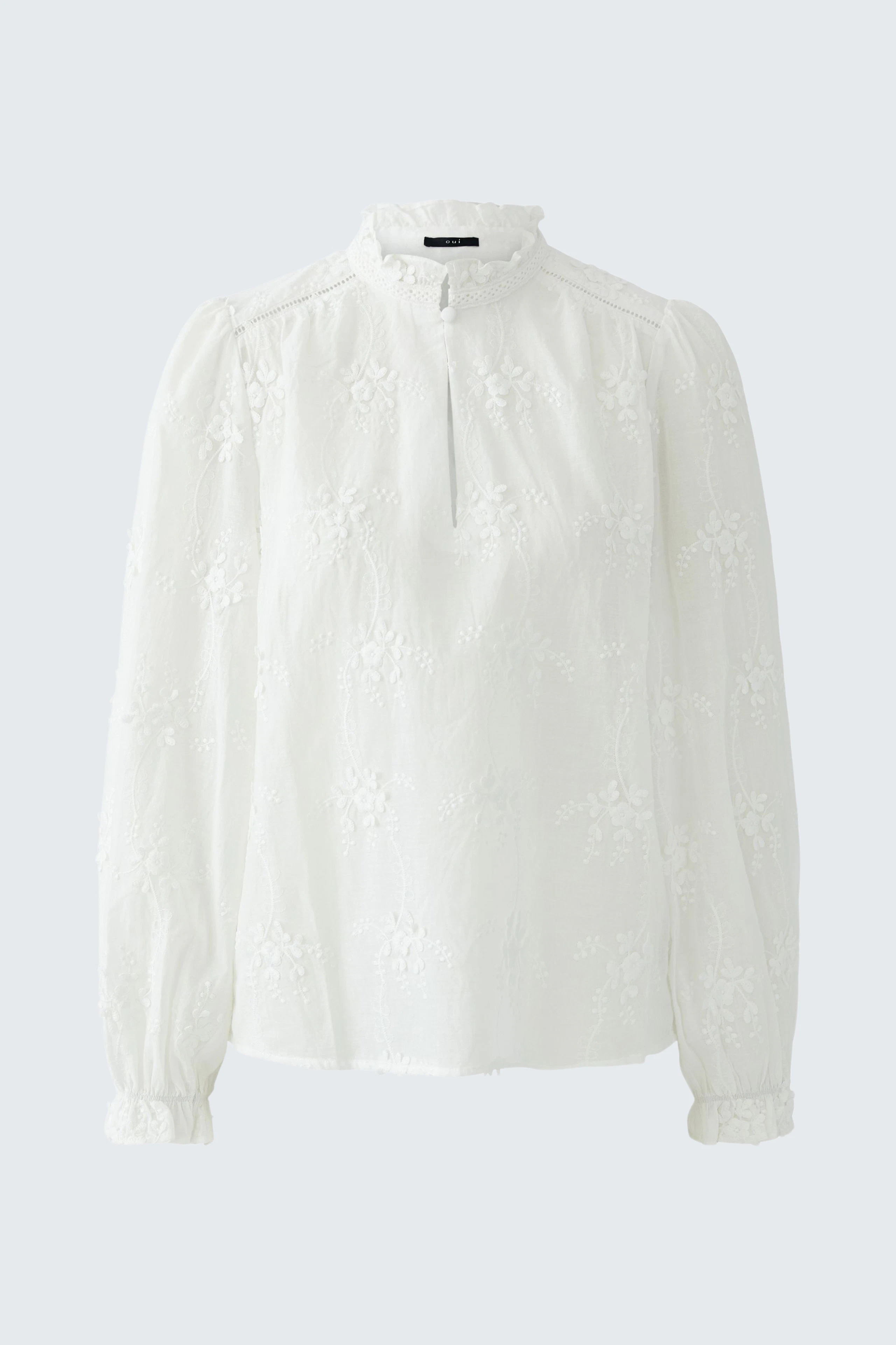 Helle Damen-Bluse mit Stehkragen und feinem Blumenmuster, ideal für den Alltag.