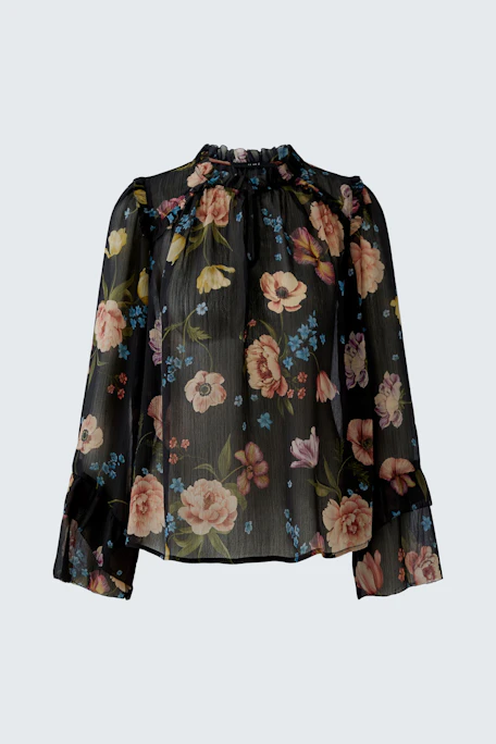 Floral blouse: A woman in a sheer black blouse with colorful floral patterns and a gathered neckline.