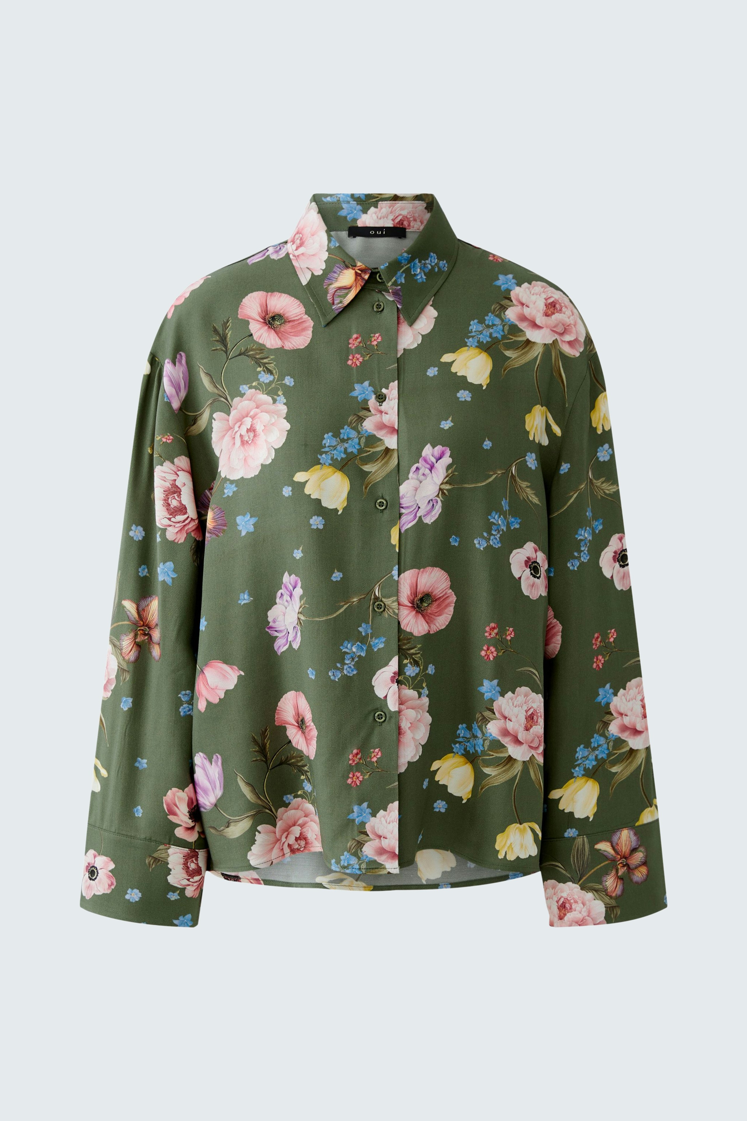 Floral blouse: A green blouse with pink and blue flowers, perfect for casual wear.