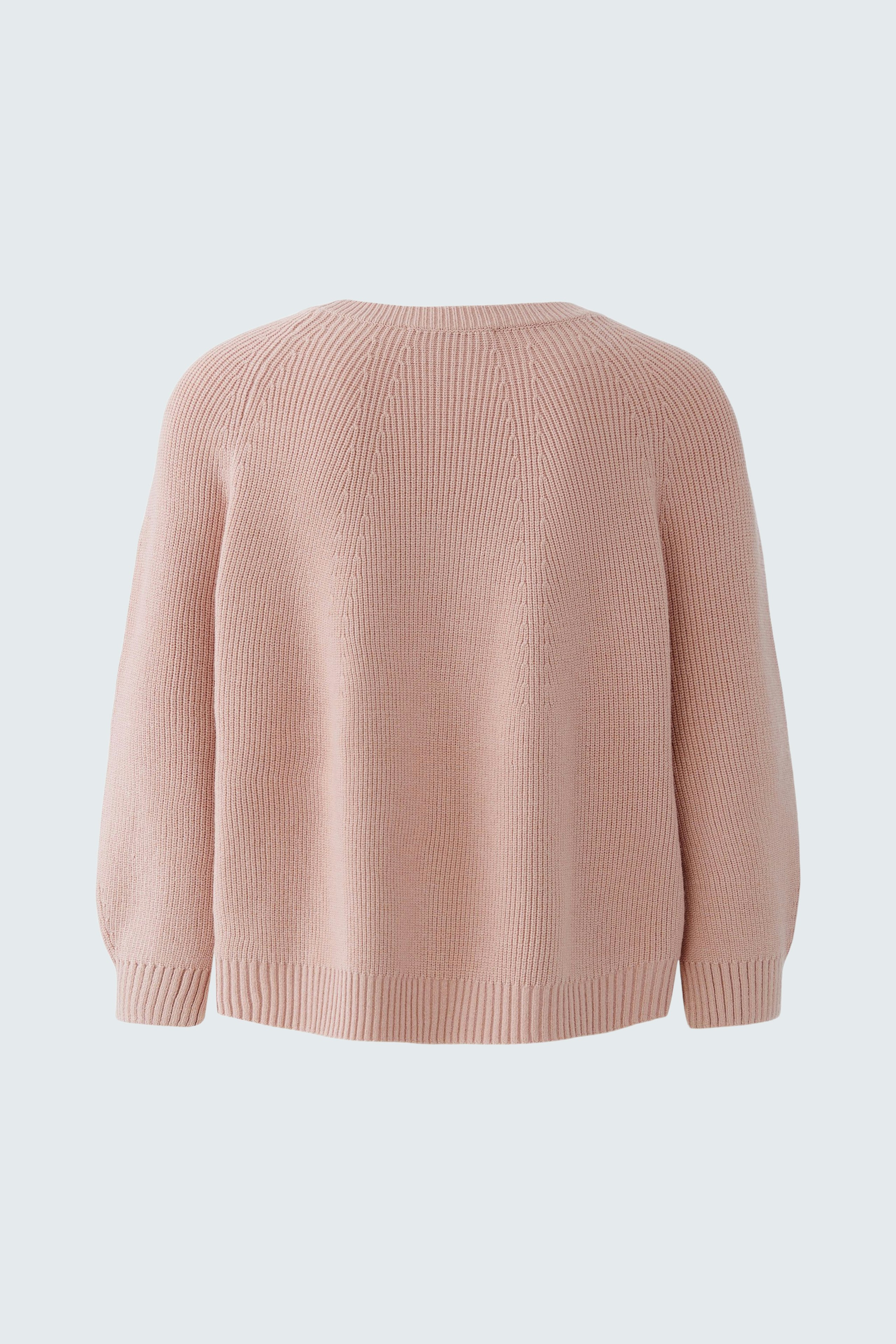 Soft pink pullover with a relaxed fit, perfect for casual layering.
