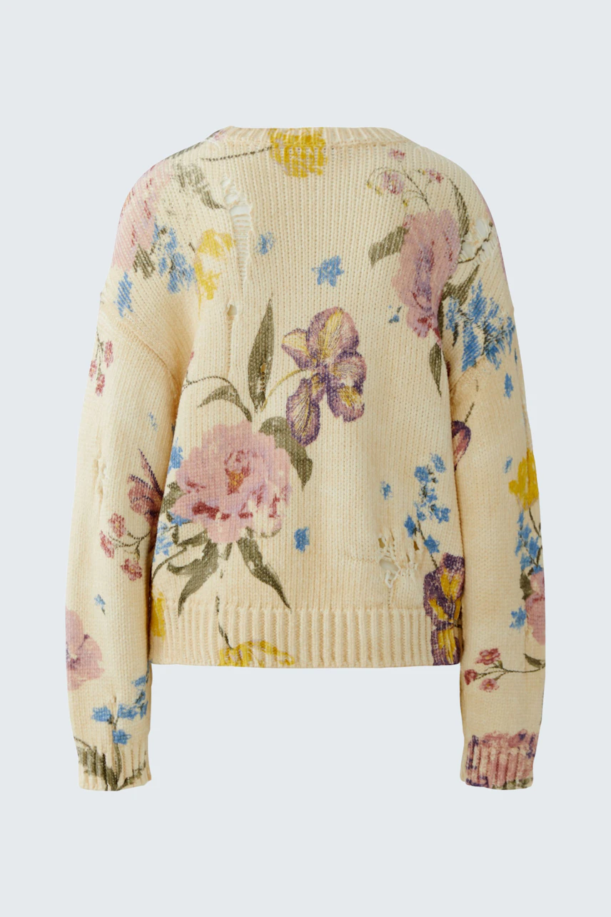 Floral women's pullover in soft yellow with colorful flower patterns, perfect for casual wear.