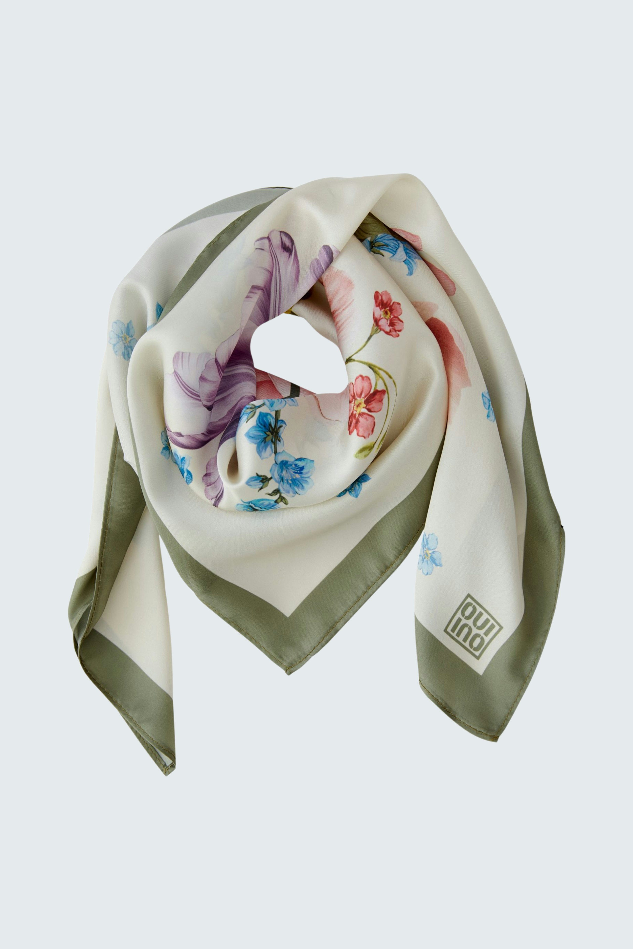 Floral scarf in soft fabric, featuring a mix of colors and patterns, perfect for adding style.