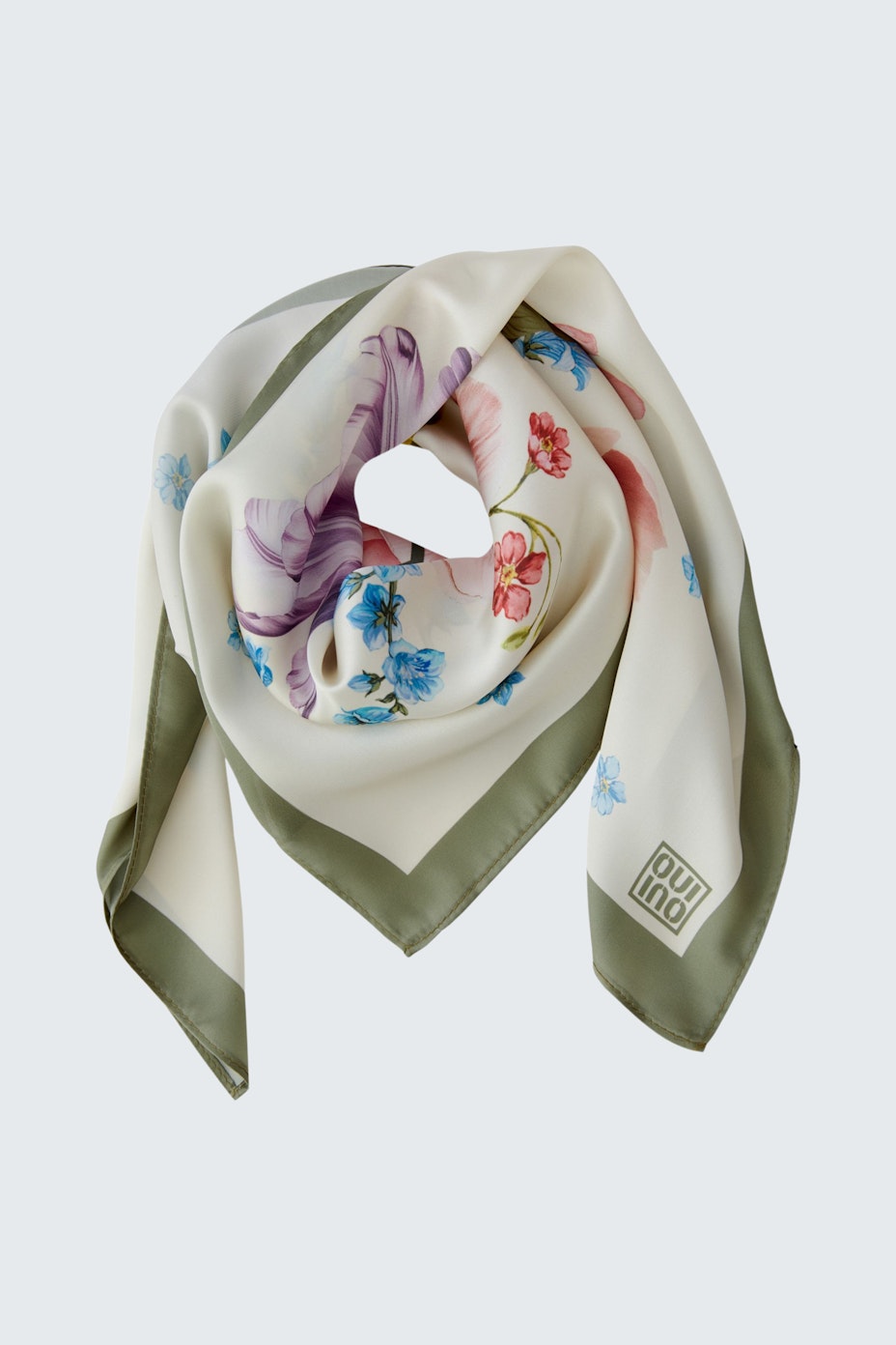 Floral scarf in soft fabric, featuring a mix of colors and patterns, perfect for adding style.