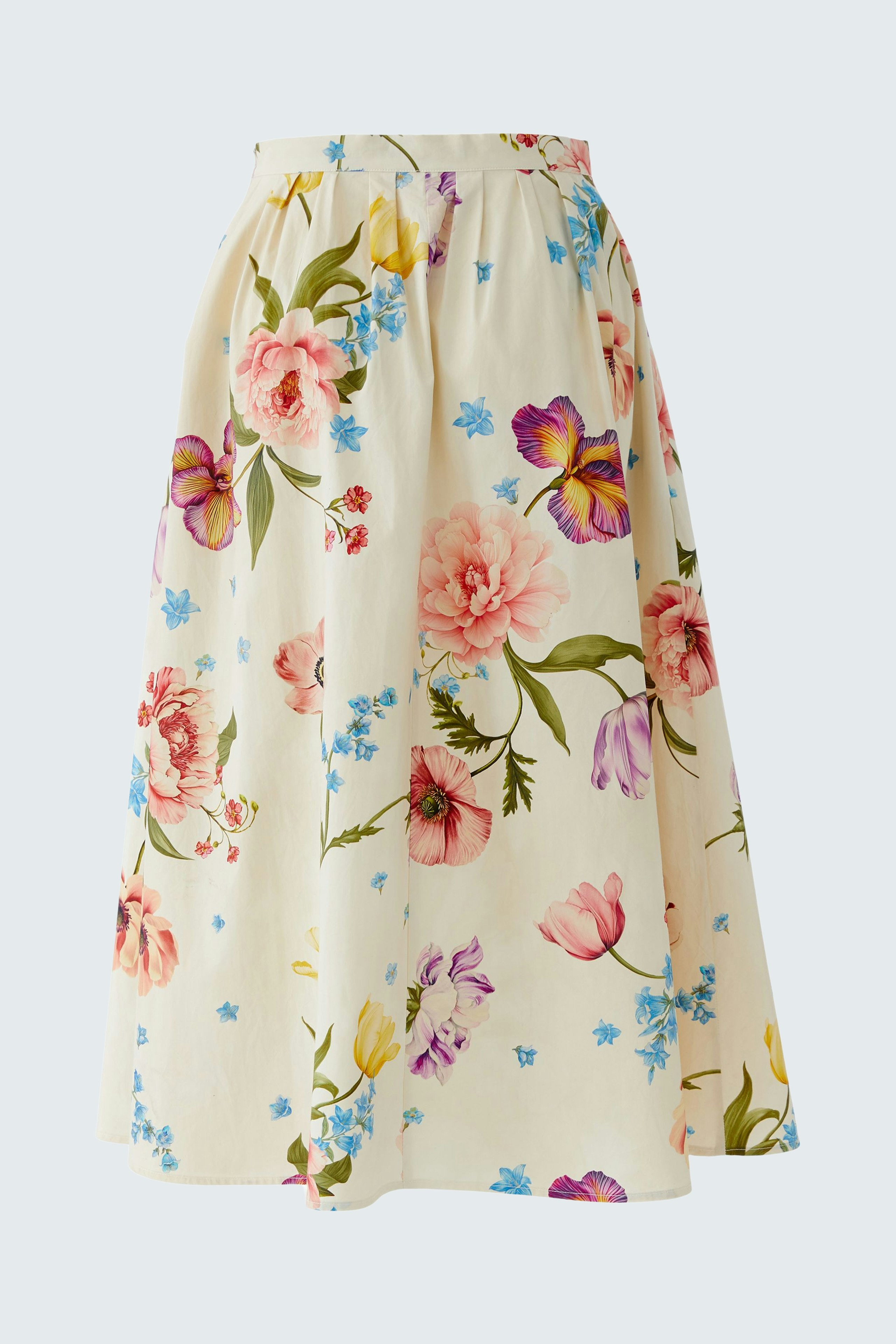 Floral midirock: A woman in a flowy skirt with colorful flowers, perfect for casual outings.