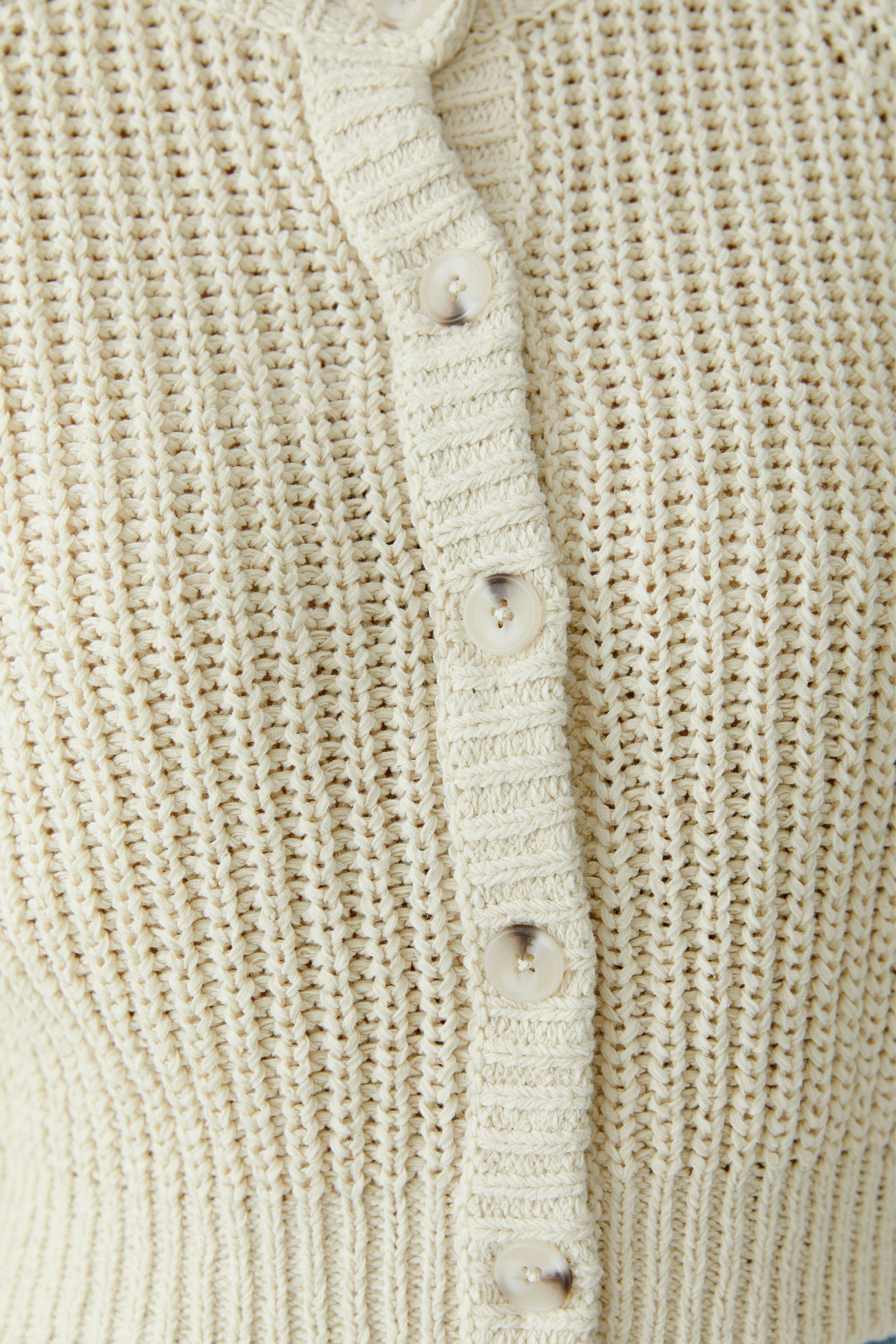 Lightweight women's cardigan with button closure, perfect for layering in casual outfits.