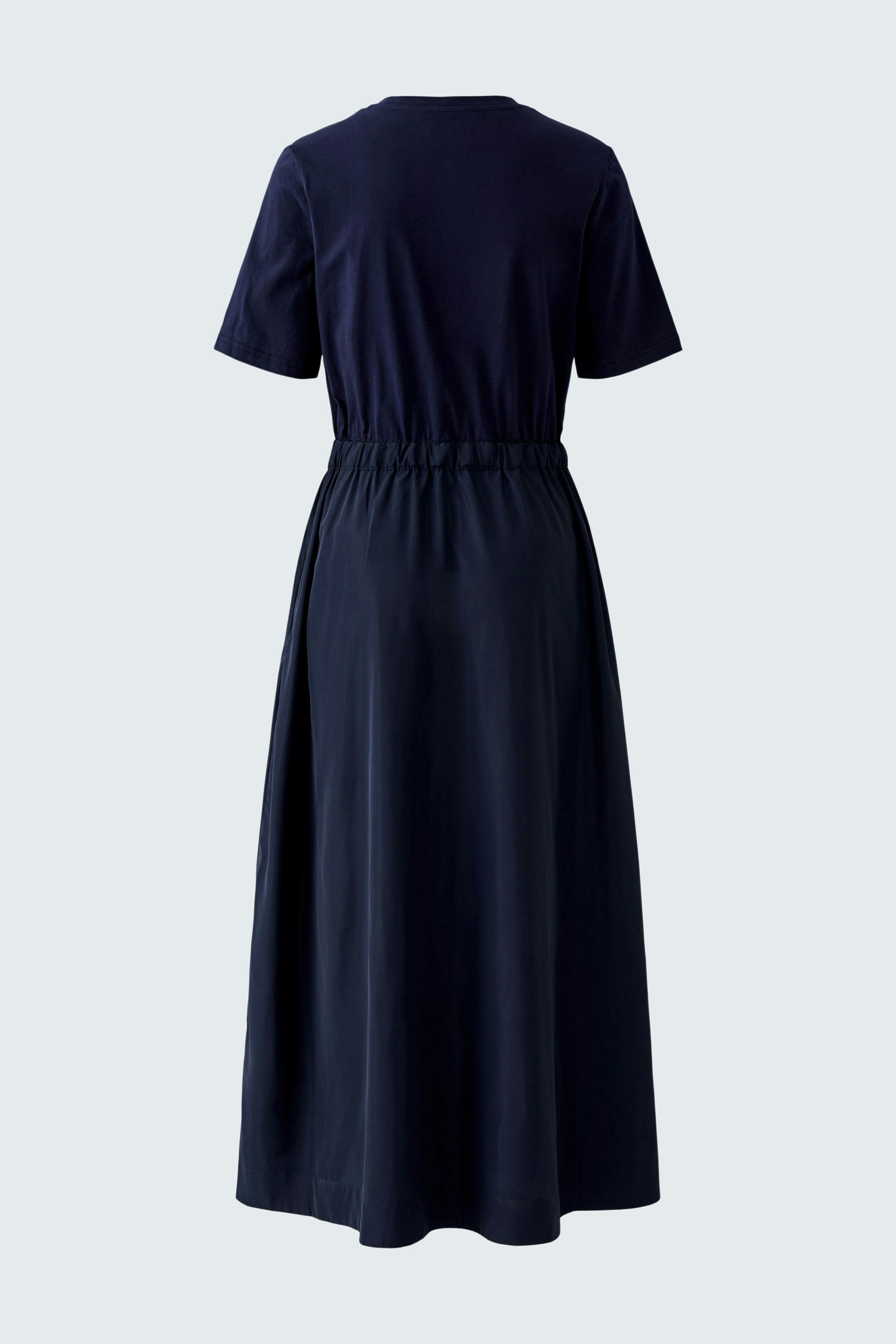 Casual maxi dress: A woman in a navy blue dress with short sleeves and a relaxed fit.