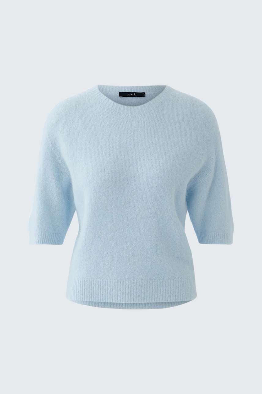 Helle Damen-Pullover in sanftem Blau mit kurzen Ärmeln und lässigem Schnitt.