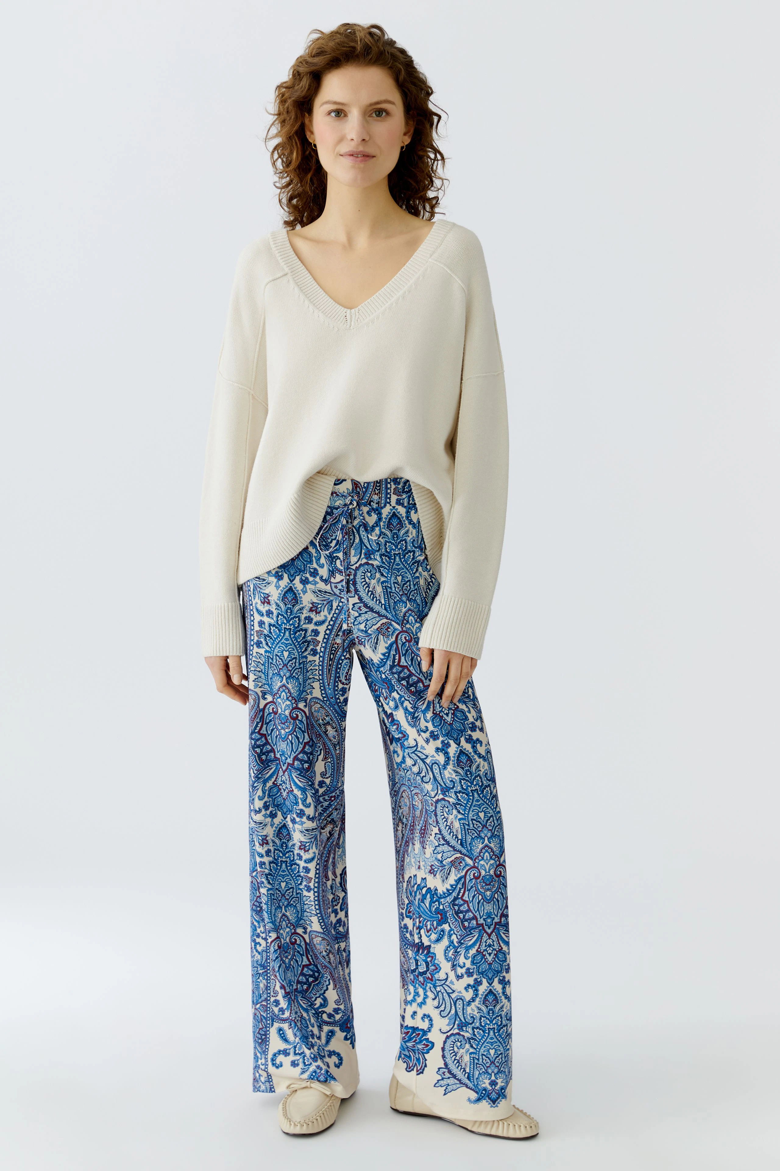 Comfortable women's joggers in a vibrant blue pattern, perfect for casual wear.