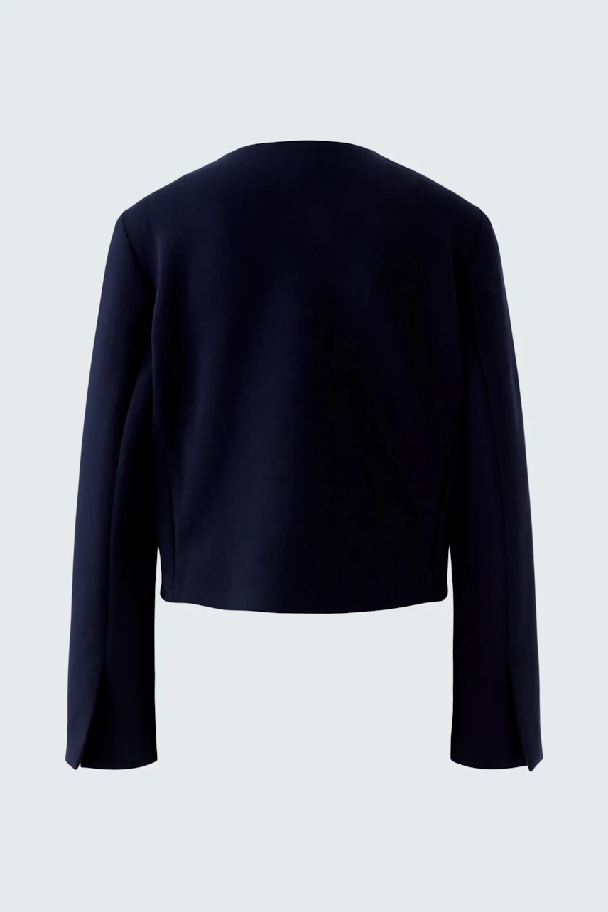 Casual women's jacket: Back view of a navy blue jacket with long sleeves and a cropped design.
