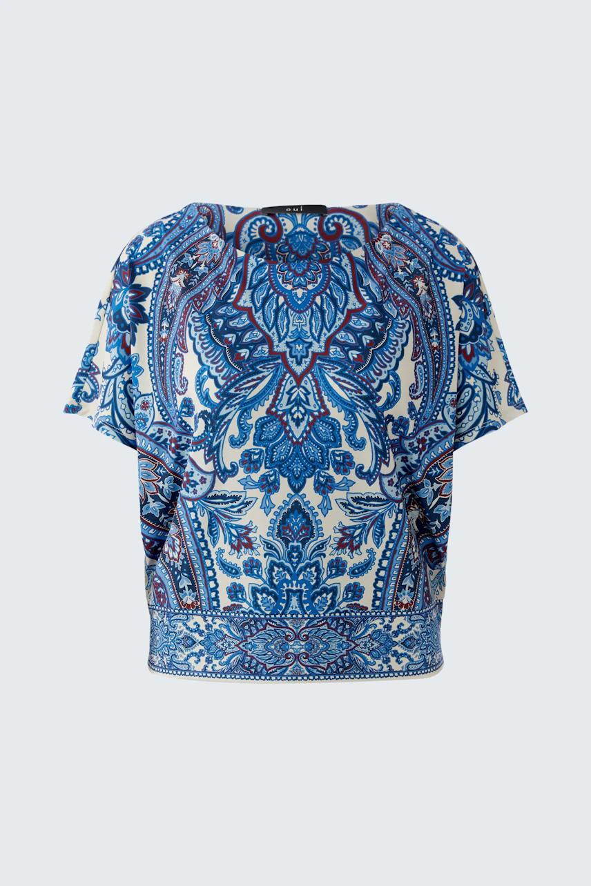 Stylish women's blouse shirt in blue and white floral pattern, featuring a relaxed fit.