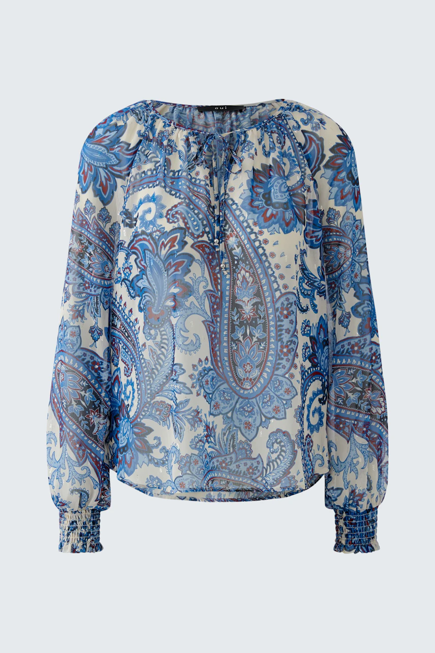 Lightweight women's blouse with a blue paisley pattern and gathered neckline.