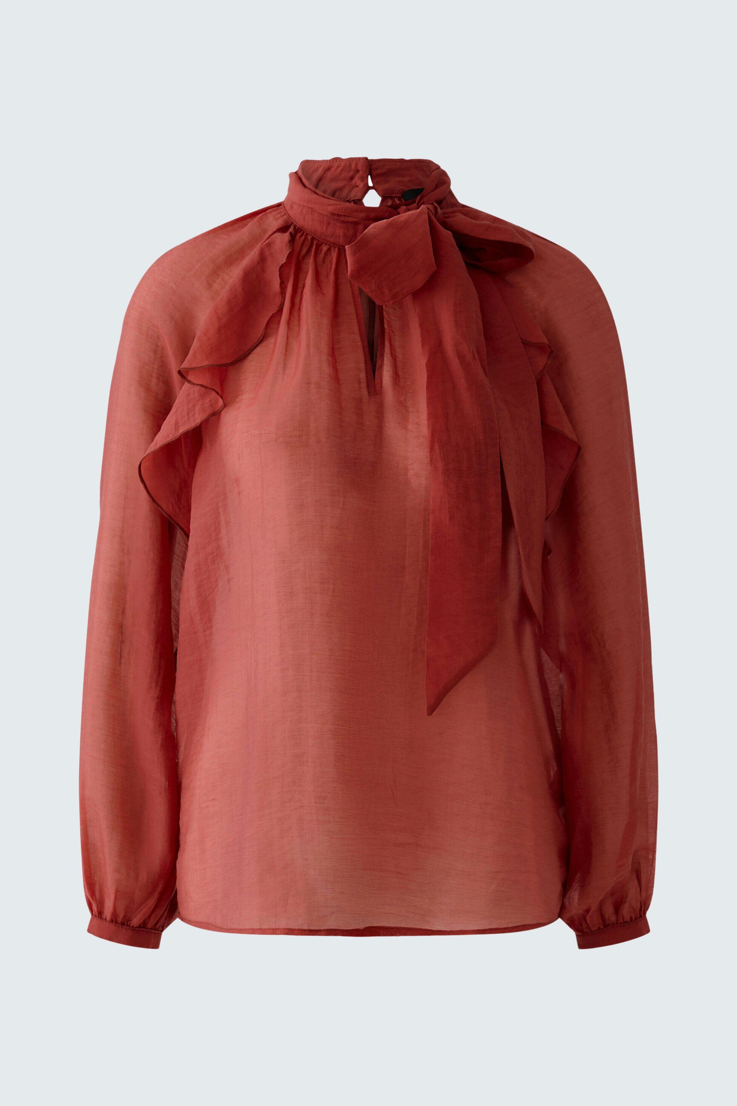 Chic women's blouse in rust color with ruffled details and a bow tie collar.