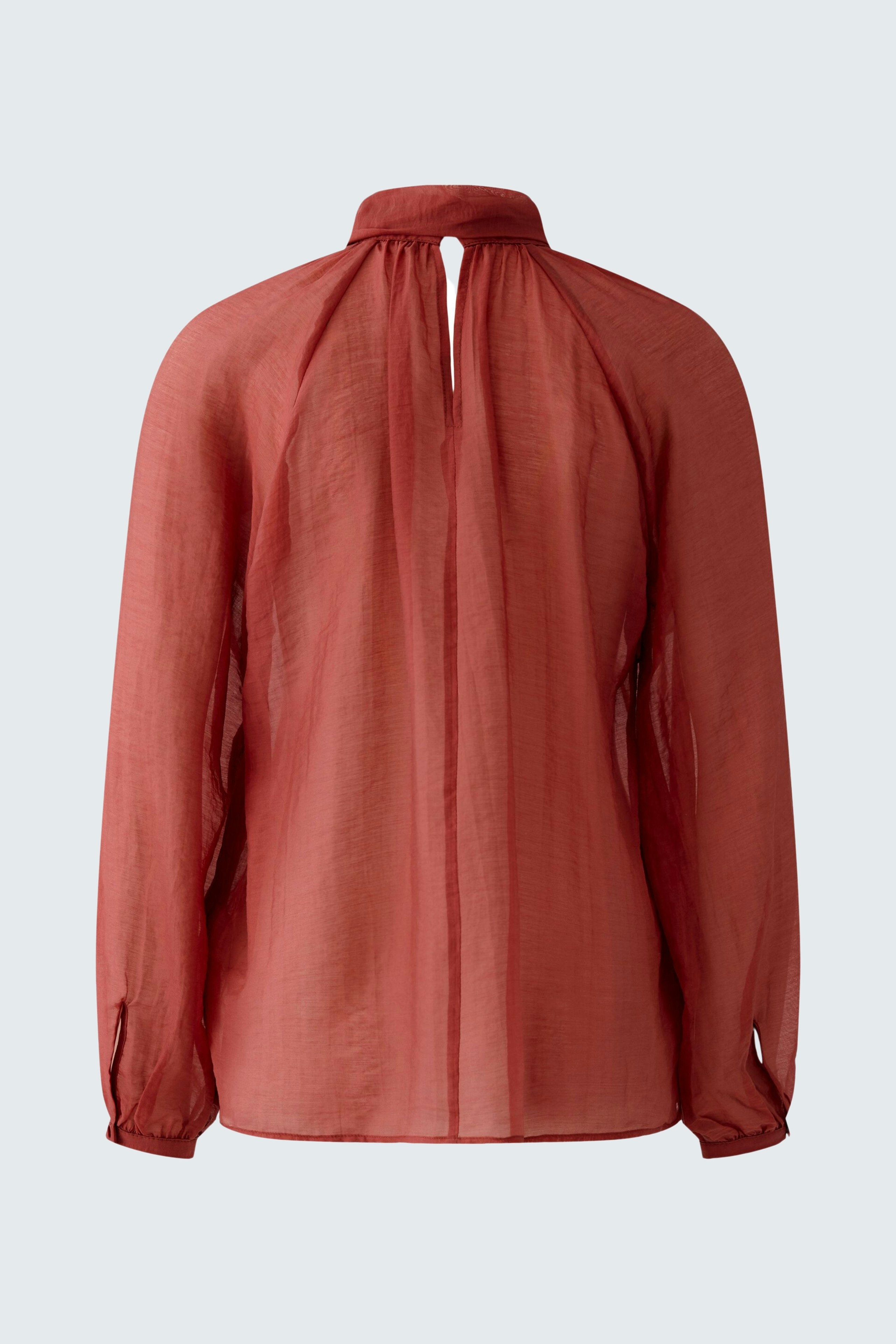 Lightweight women's blouse in rust color with a relaxed fit and back keyhole detail.